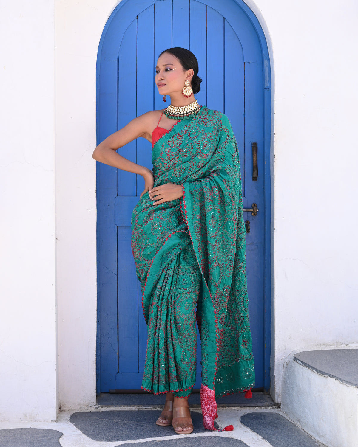 TEAL GREEN CIRCLES OF THE LIFE BANDHANI SAREE WITH MUKAISH WORK AND TASSELS