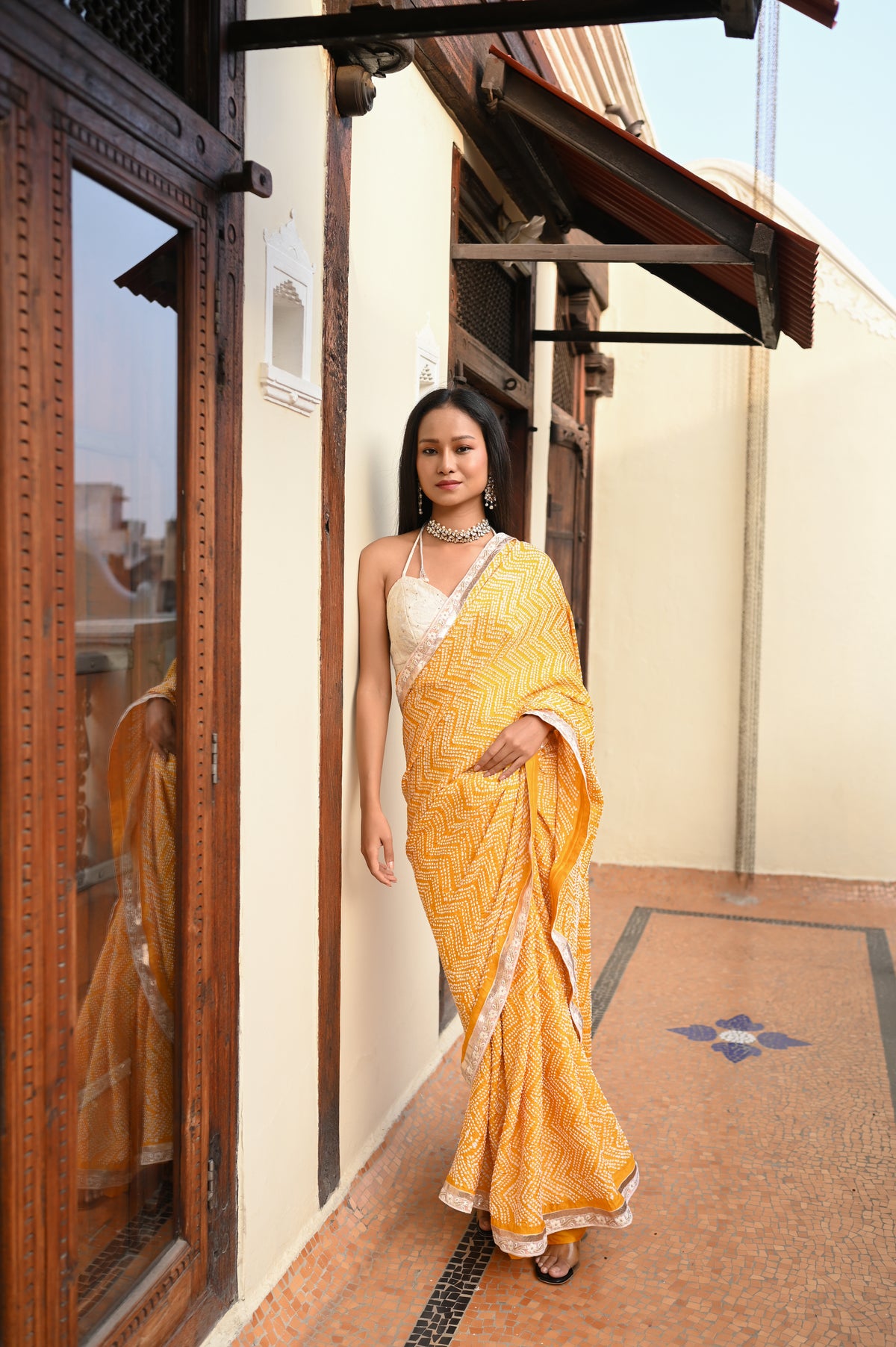 YELLOW O3 CHEVRON BANDHANI SILK SAREE WITH LAMPI BORDER AND TASSELS