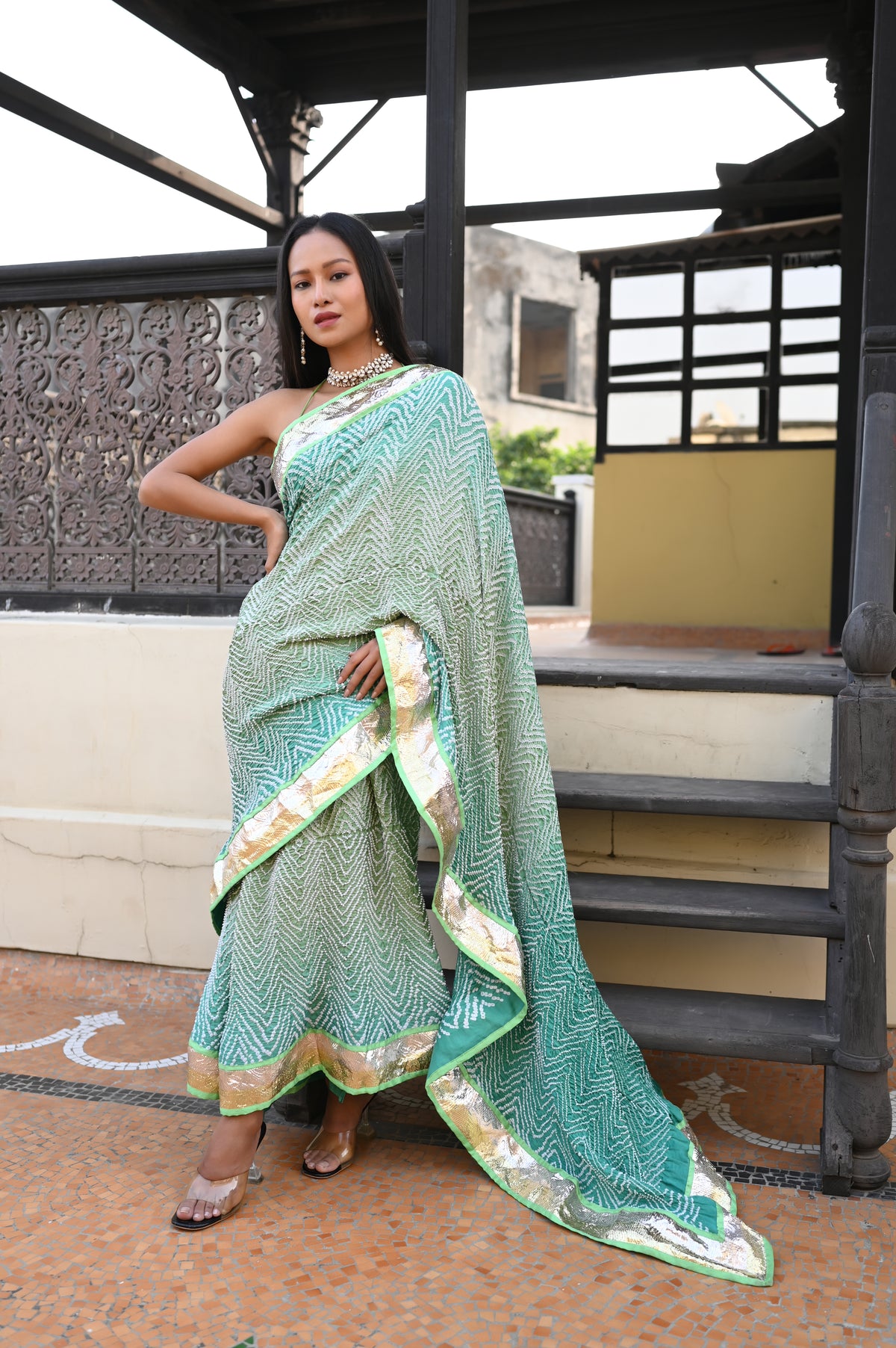 LIGHT GREEN F12 CHEVRON BANDHANI SILK SAREE WITH LAMPI BORDER AND TASSELS
