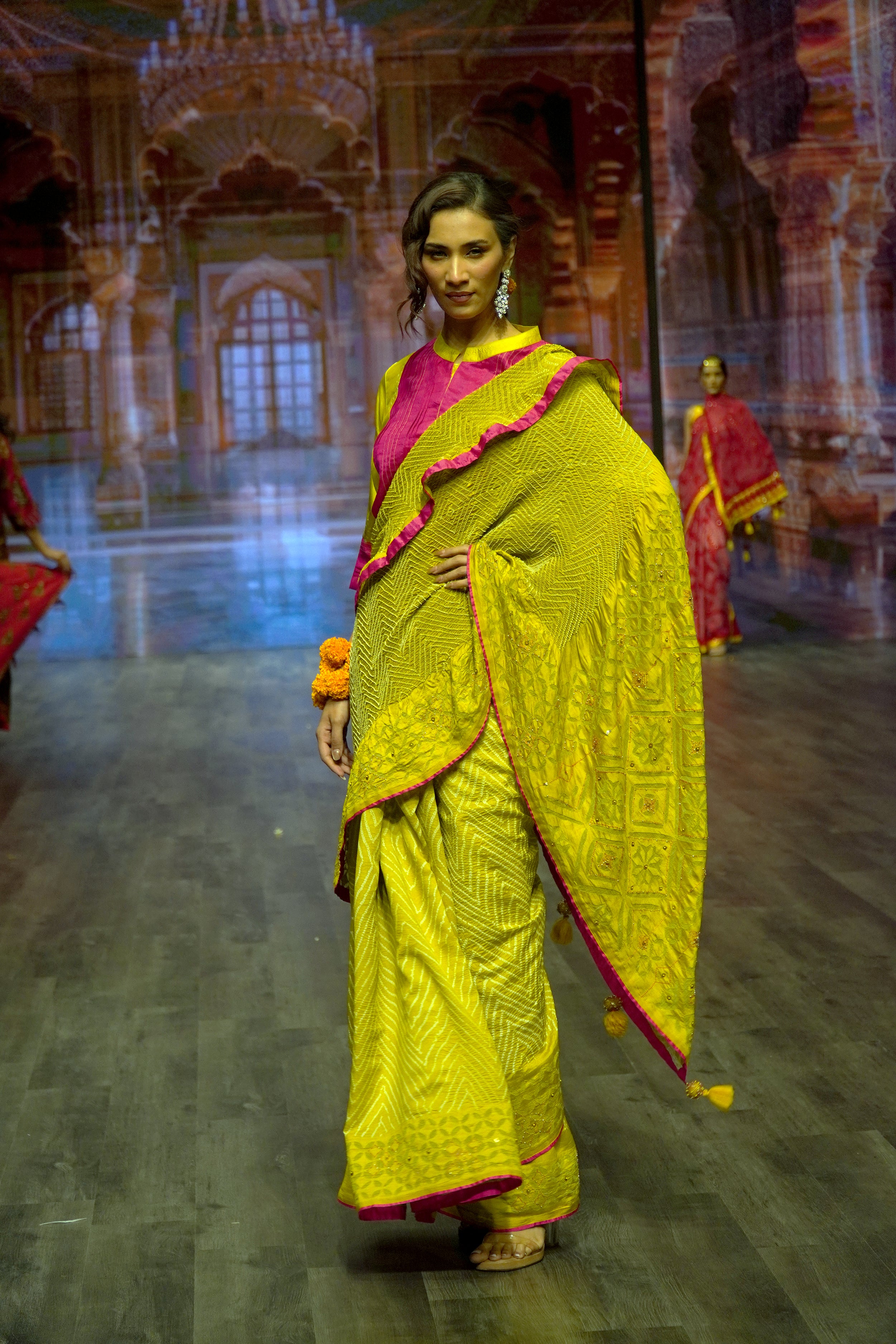MUSTARD YELLOW APPLIQUE EMBROIDERED SILK BANDHANI SAREE WITH TASSELS