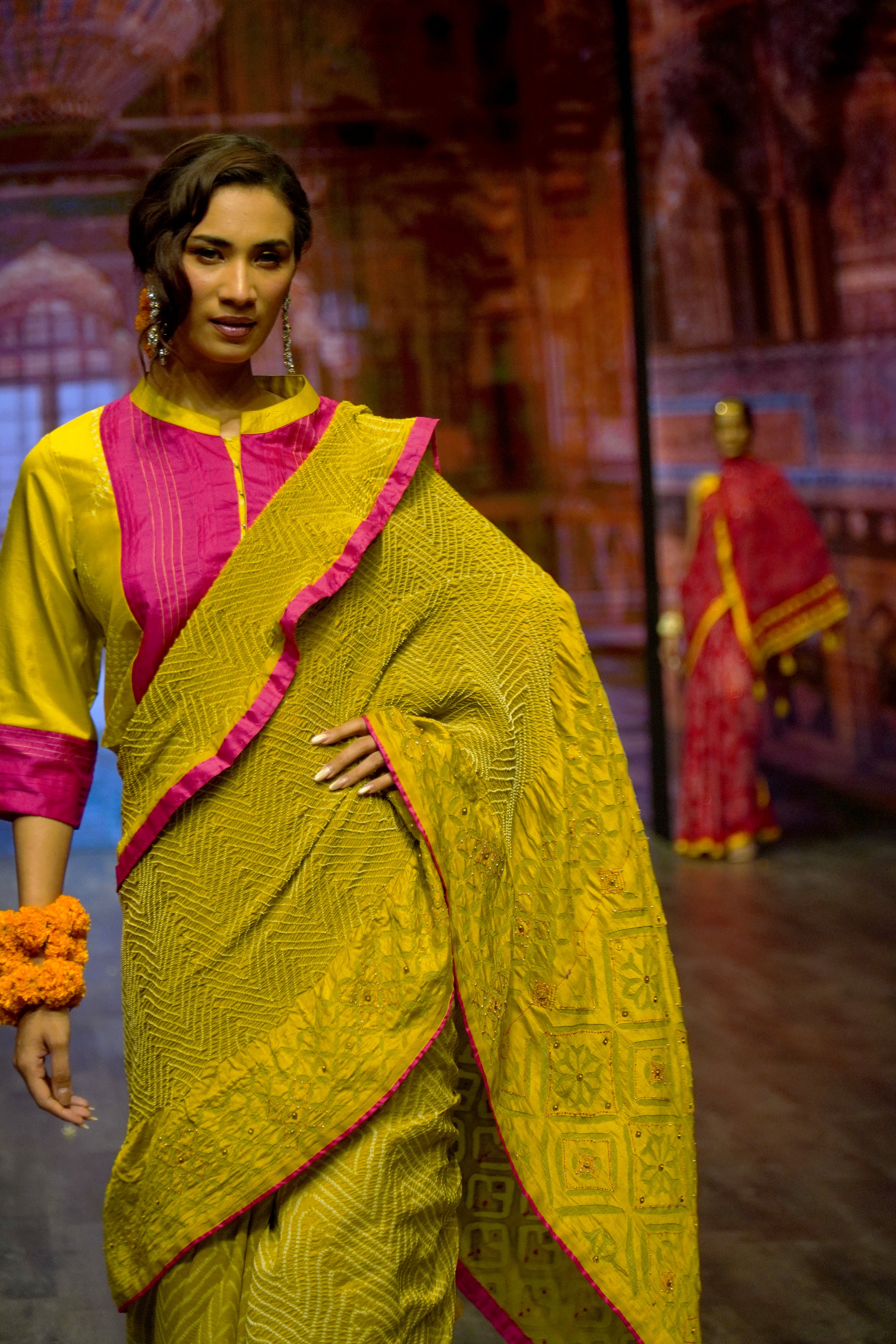MUSTARD YELLOW APPLIQUE EMBROIDERED SILK BANDHANI SAREE WITH TASSELS