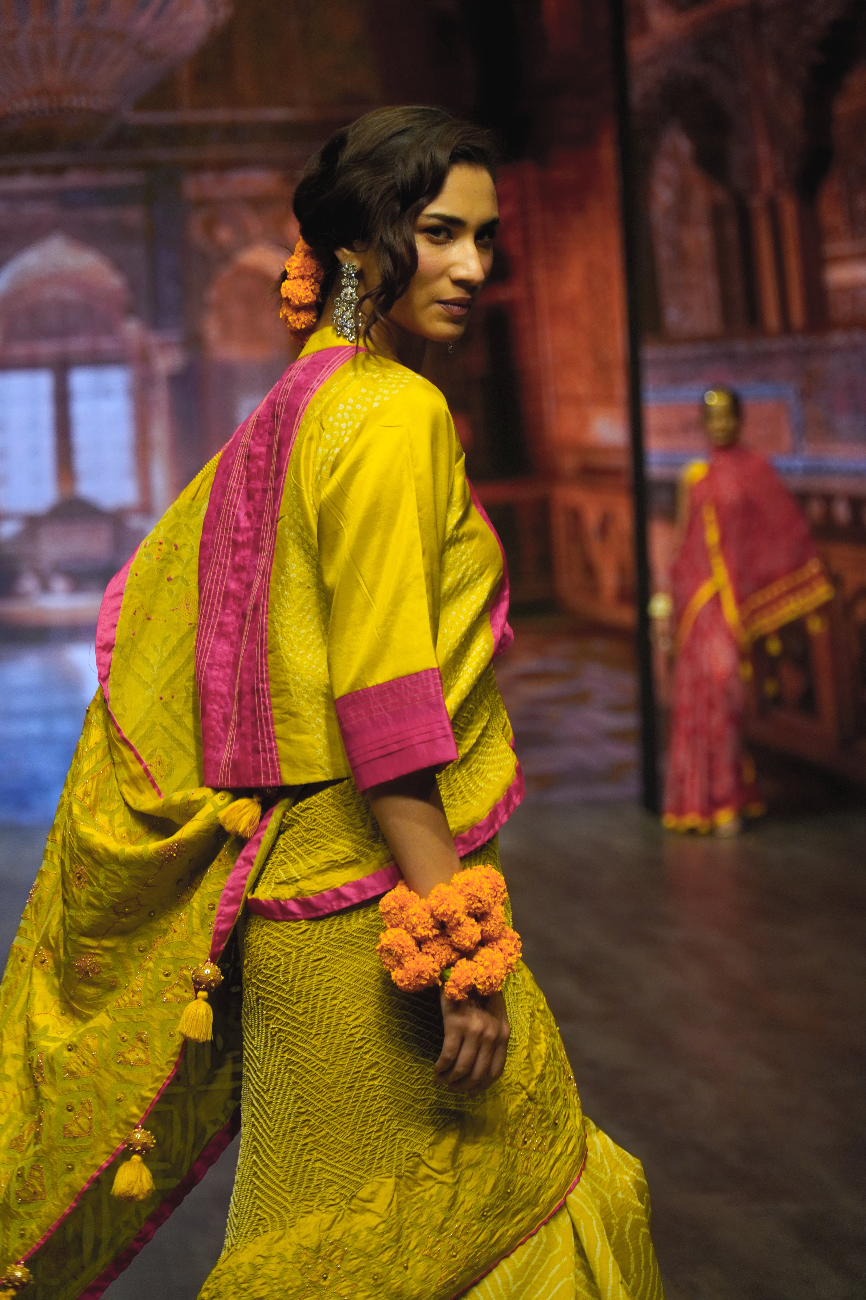MUSTARD YELLOW APPLIQUE EMBROIDERED SILK BANDHANI SAREE WITH TASSELS