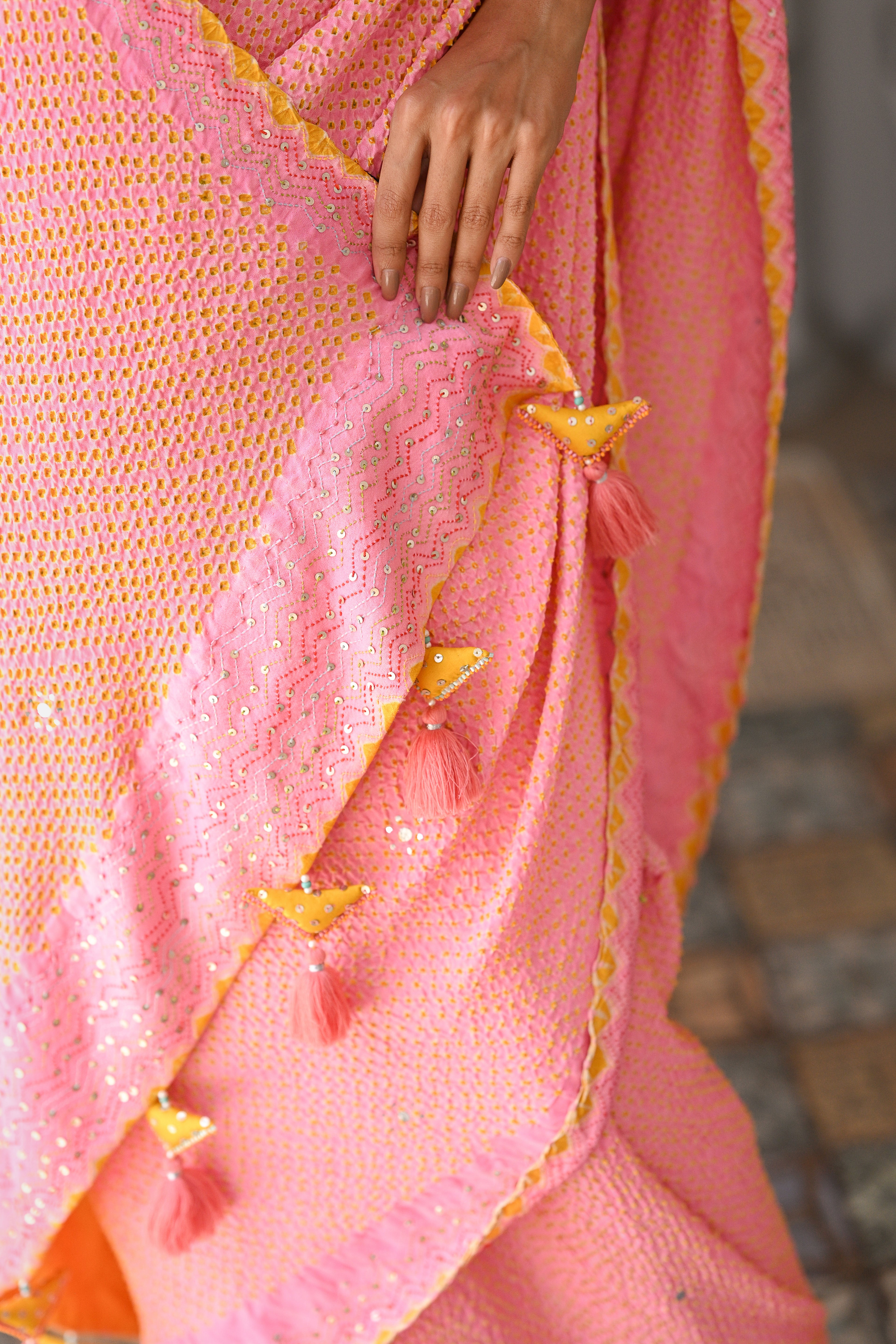 LIGHT PINK EMBROIDERED SILK BANDHANI SAREE WITH TASSELS