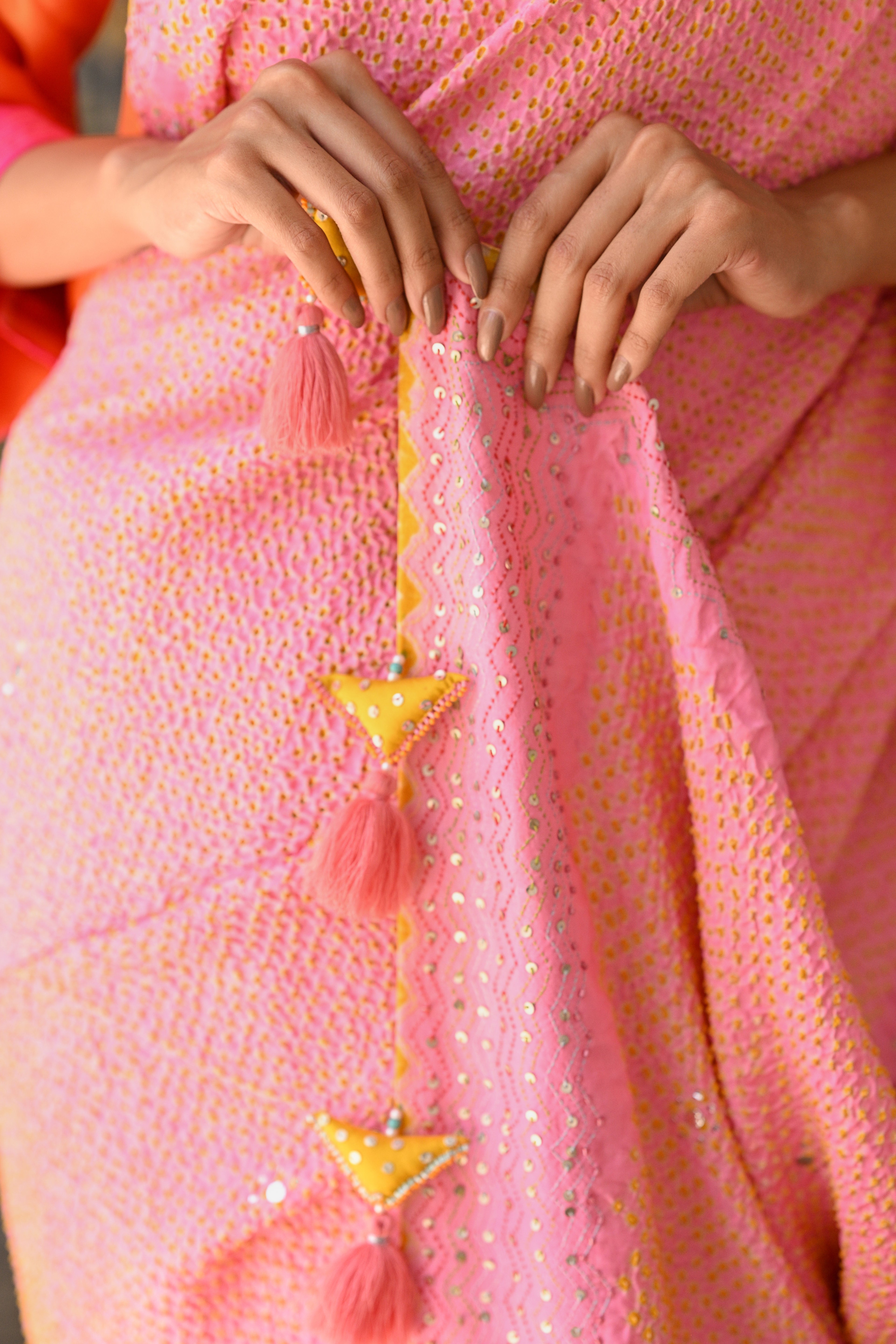 LIGHT PINK EMBROIDERED SILK BANDHANI SAREE WITH TASSELS