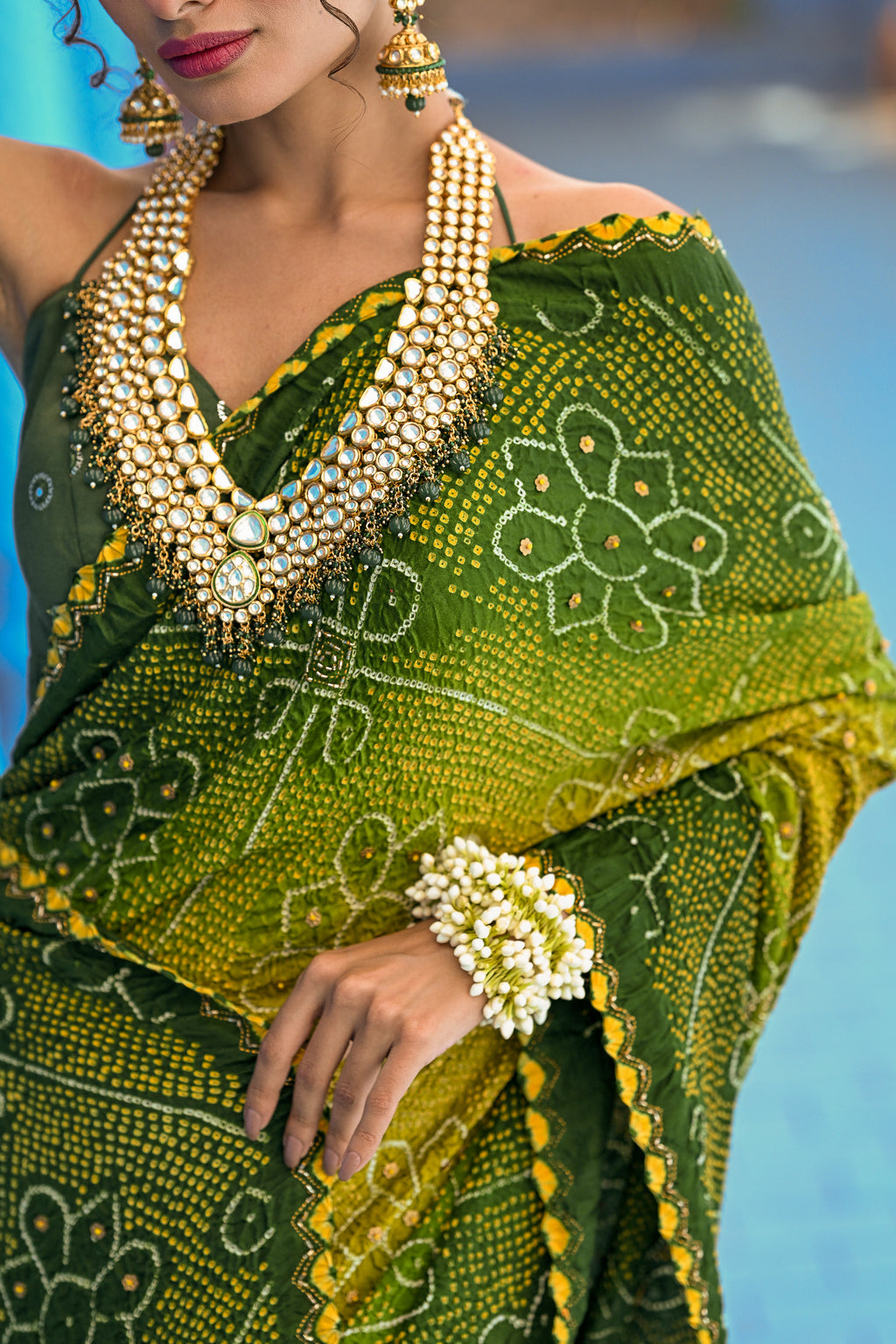 GREEN POPPY FLOWER SILK BANDHANI EMBROIDERED SAREE WITH TASSELS