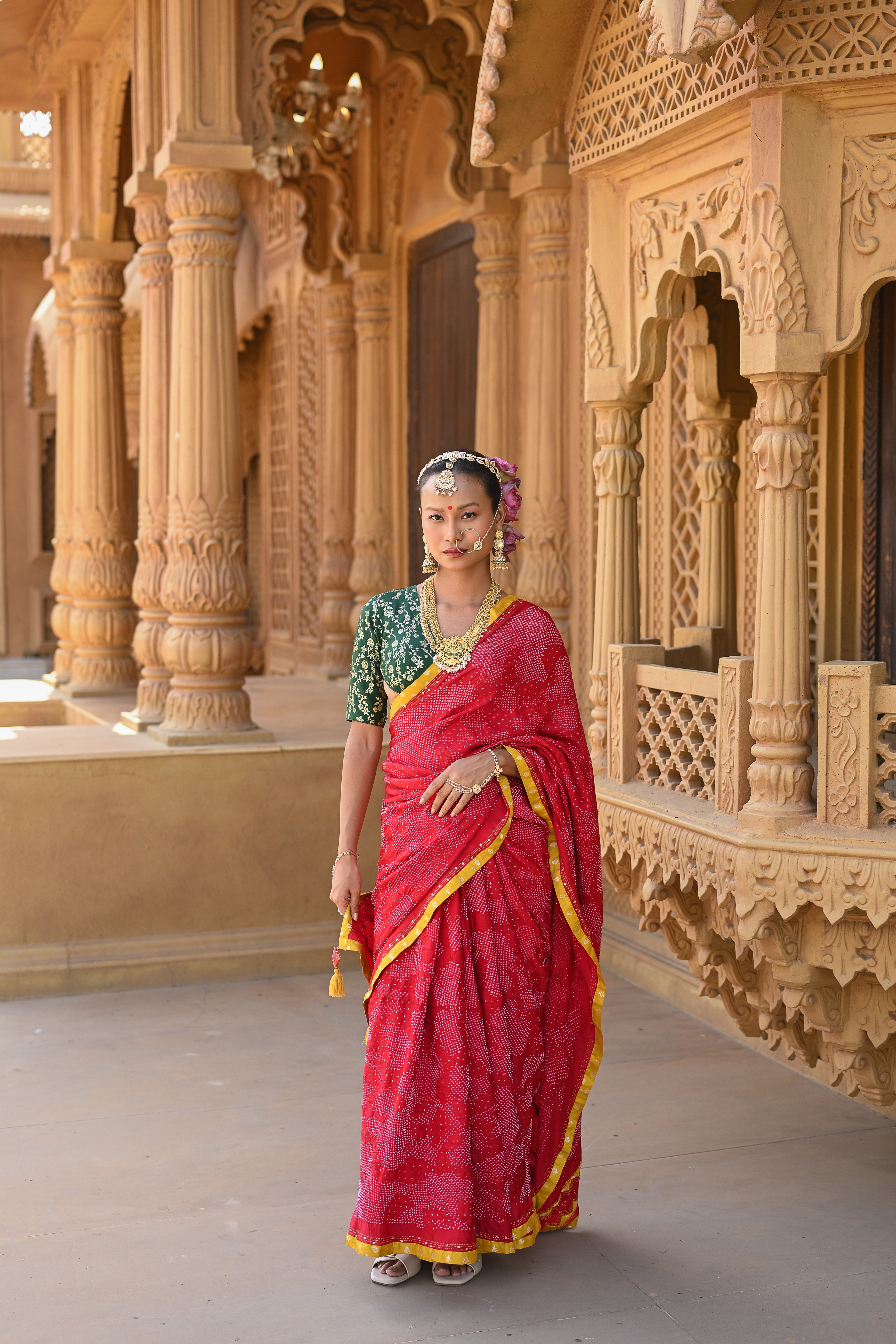 RED ABSTRACT APPLIQUE EMBROIDERED SILK BANDHANI SAREE WITH TASSELS