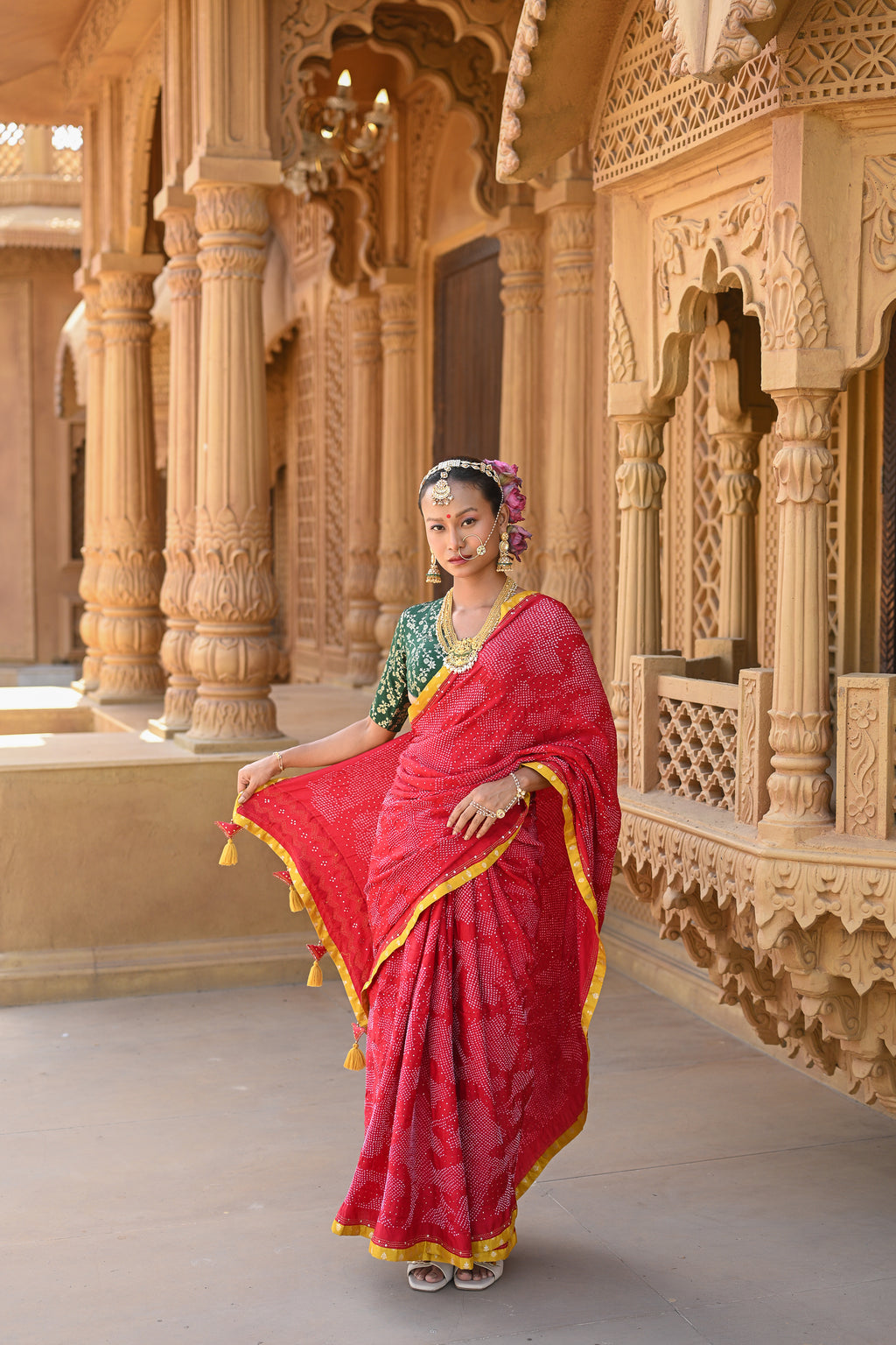 RED APPLIQUE EMBROIDERED SILK BANDHANI SAREE WITH TASSELS