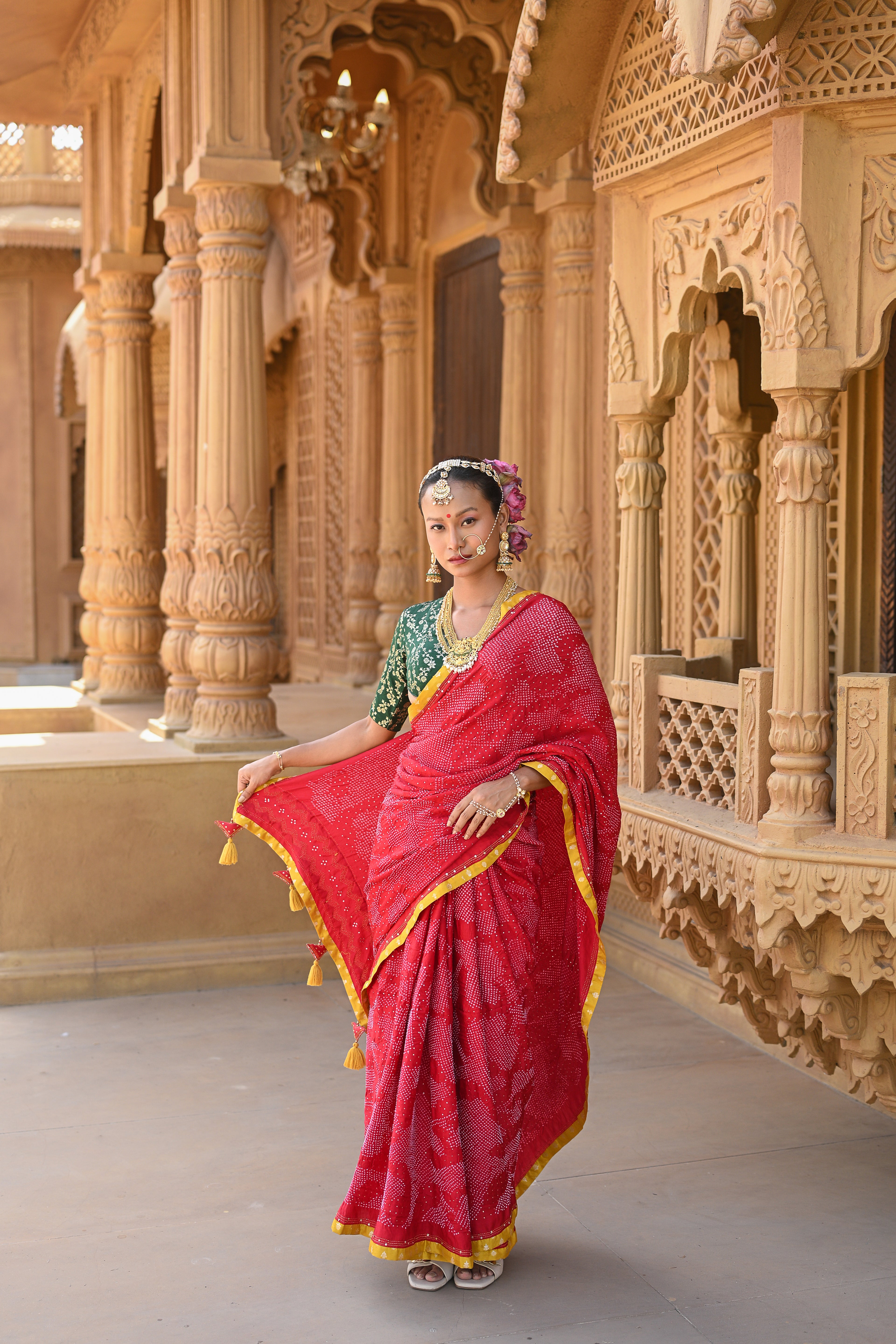 RED APPLIQUE EMBROIDERED SILK BANDHANI SAREE WITH TASSELS
