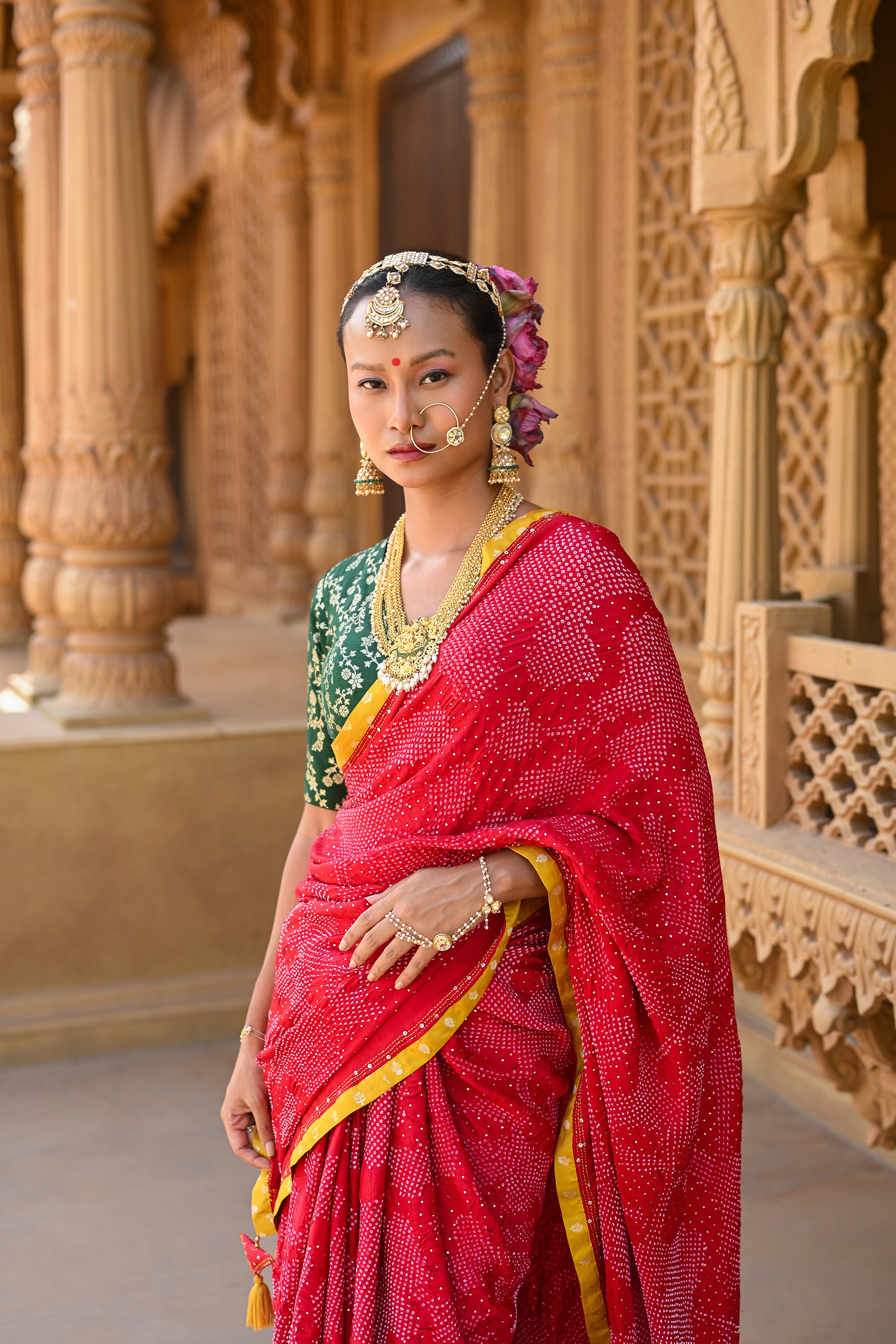 RED ABSTRACT APPLIQUE EMBROIDERED SILK BANDHANI SAREE WITH TASSELS