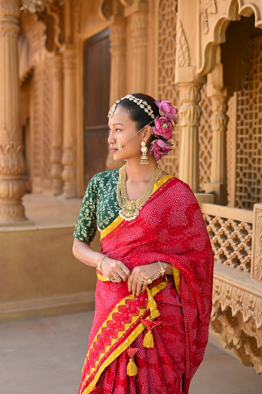 RED APPLIQUE EMBROIDERED SILK BANDHANI SAREE WITH TASSELS