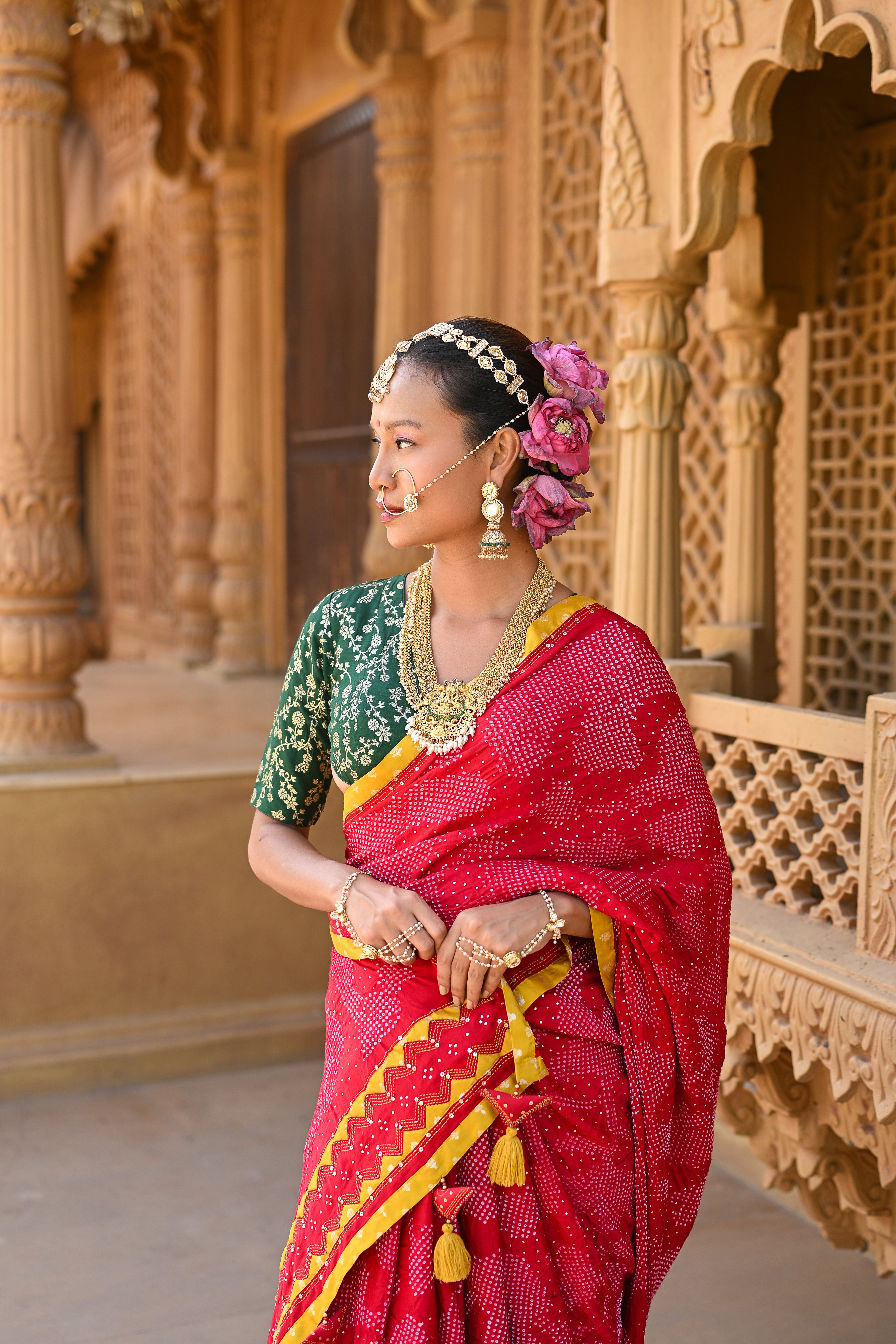 RED APPLIQUE EMBROIDERED SILK BANDHANI SAREE WITH TASSELS