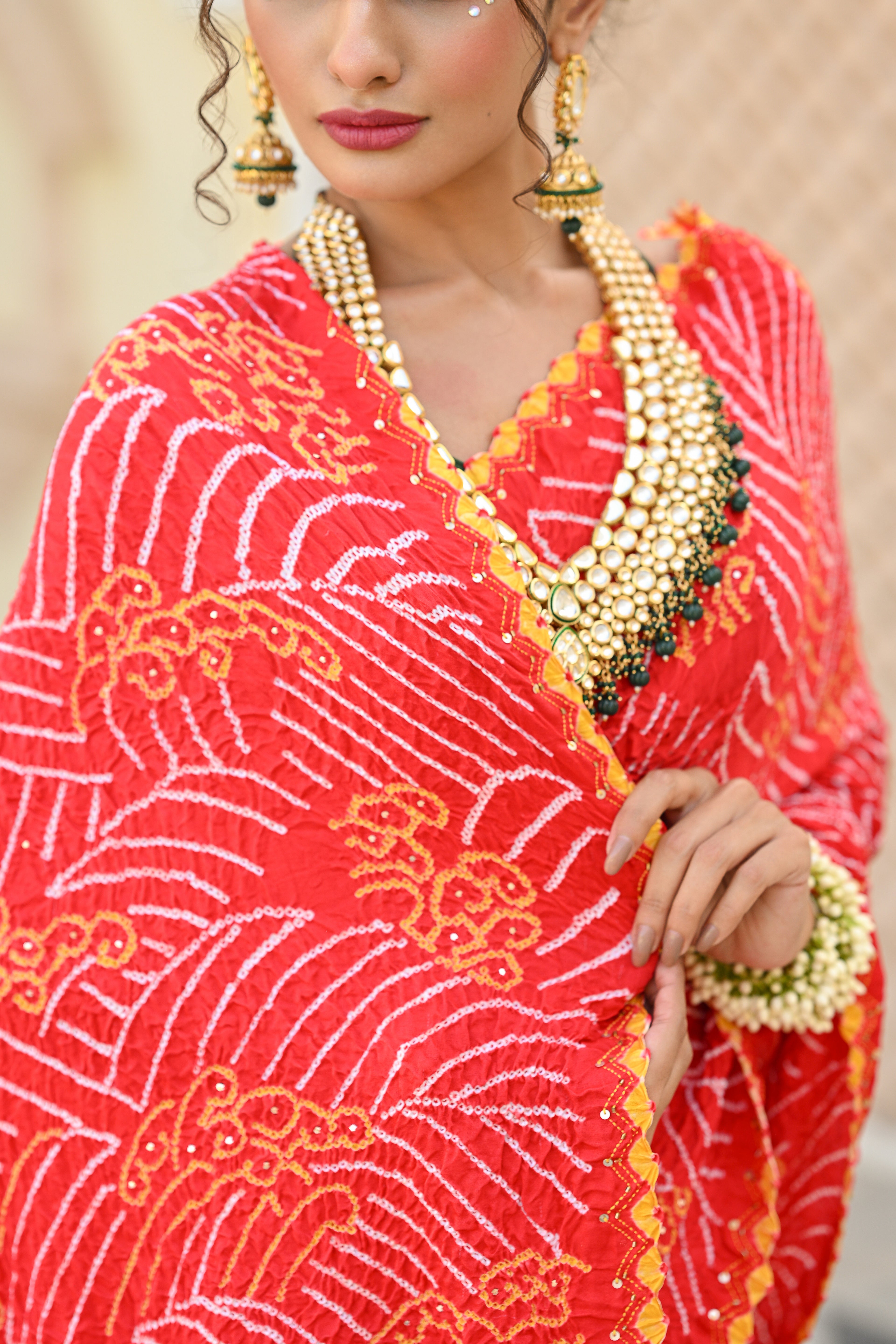 RED JAPANESE WAVE EMBROIDERED SILK BANDHANI SAREE WITH TASSELS