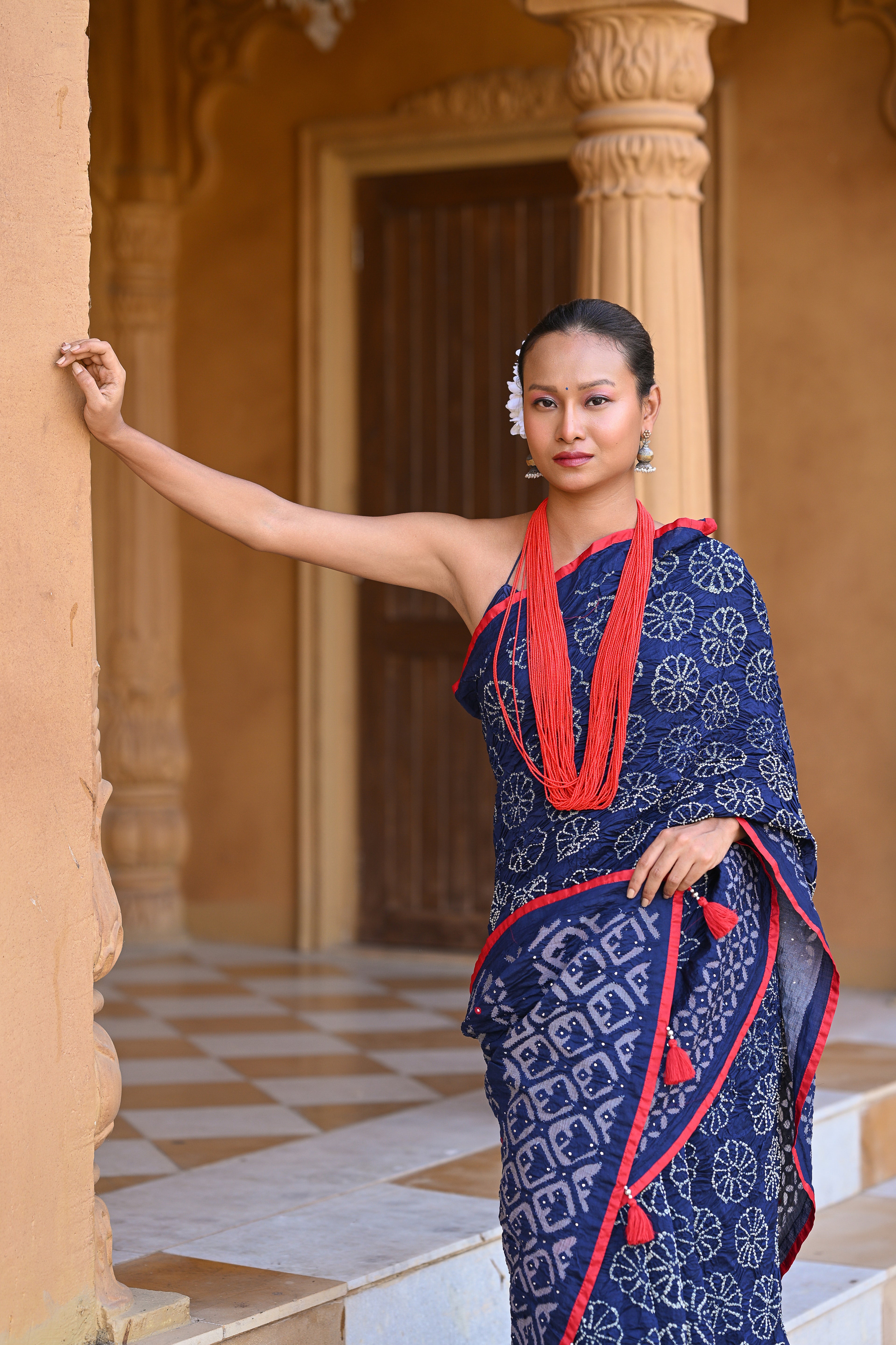 INDIGO BLUE APPLIQUE EMBROIDERED SILK BANDHANI SAREE WITH TASSELS