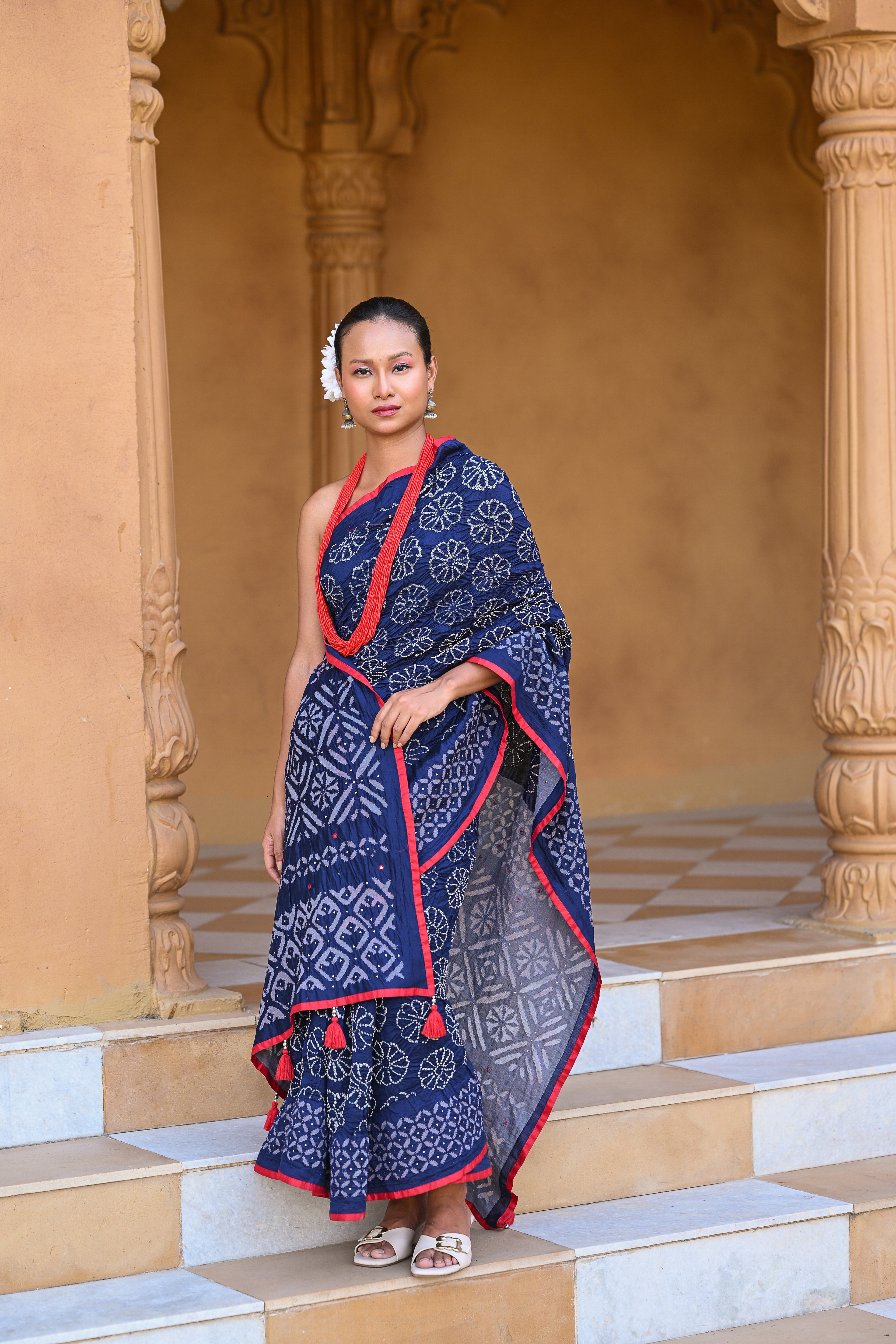 INDIGO BLUE APPLIQUE EMBROIDERED SILK BANDHANI SAREE WITH TASSELS