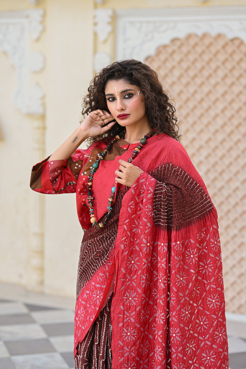 RED - BROWN APPLIQUE EMBROIDERED SILK BANDHANI SAREE WITH TASSELS