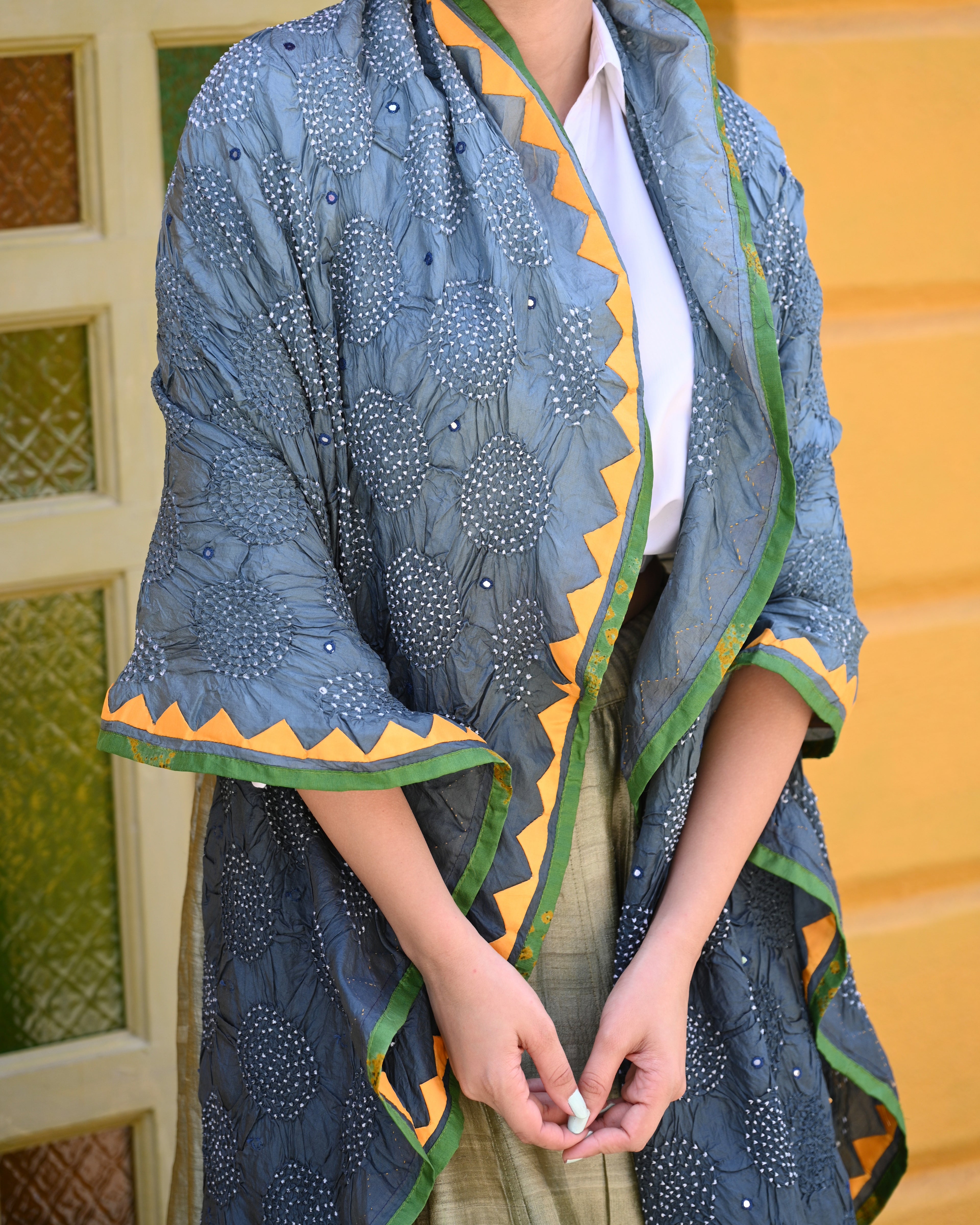 GREY CIRCLES OF THE LIFE BANDHANI SILK DUPATTA WITH LAMPI BORDER AND TASSELS