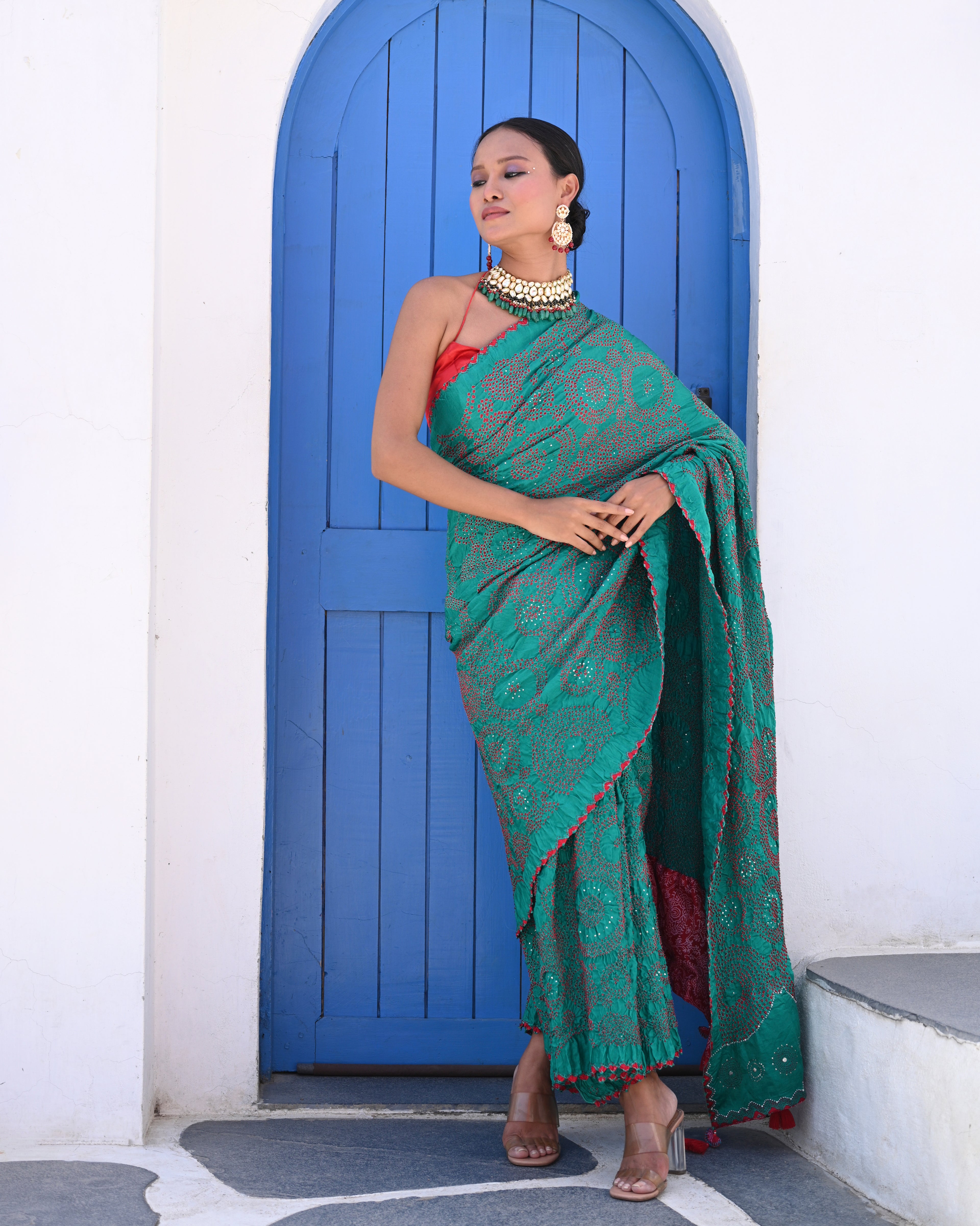 TEAL GREEN CIRCLES OF THE LIFE BANDHANI SAREE WITH MUKAISH WORK AND TASSELS