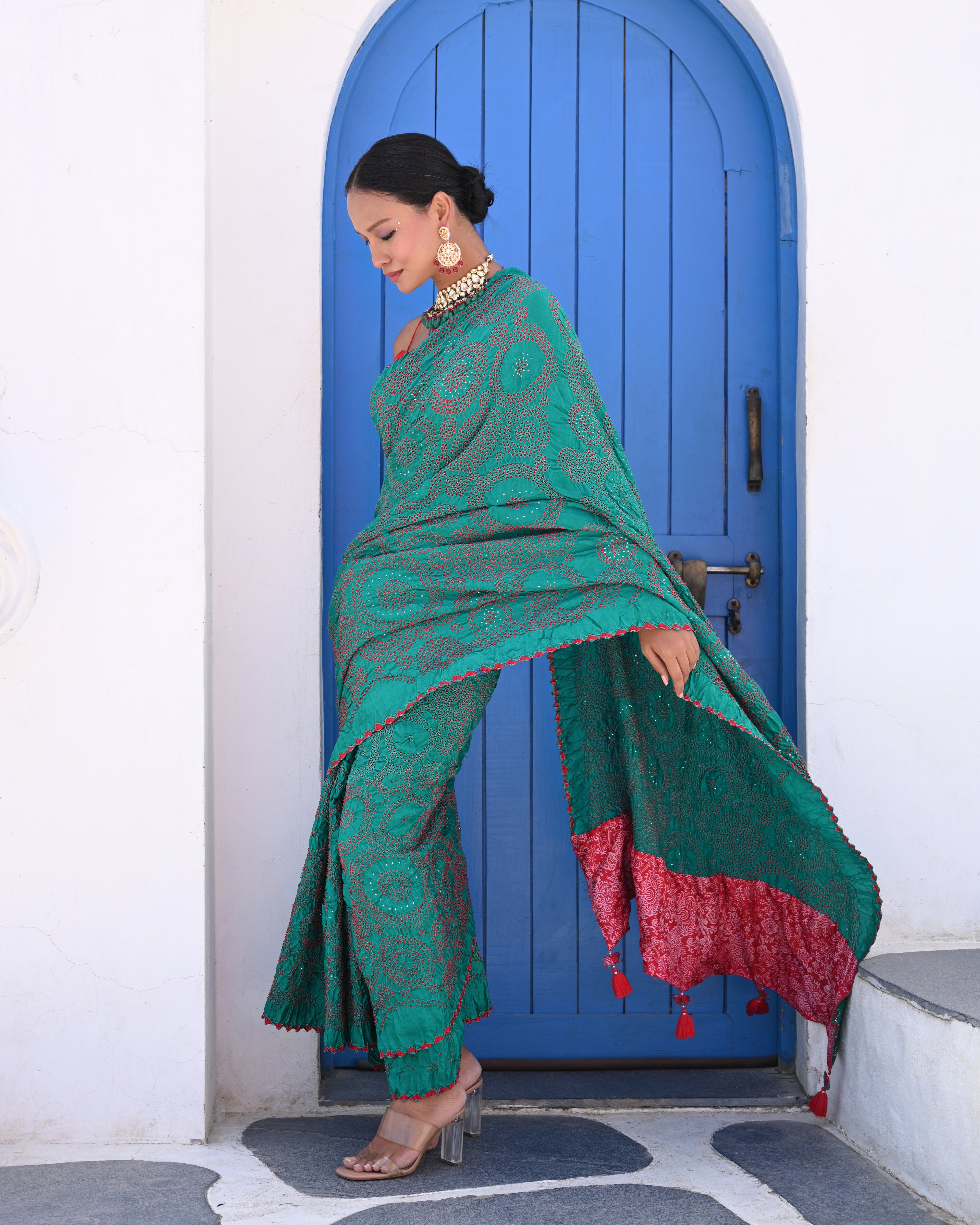TEAL GREEN CIRCLES OF THE LIFE BANDHANI SAREE WITH MUKAISH WORK AND TASSELS