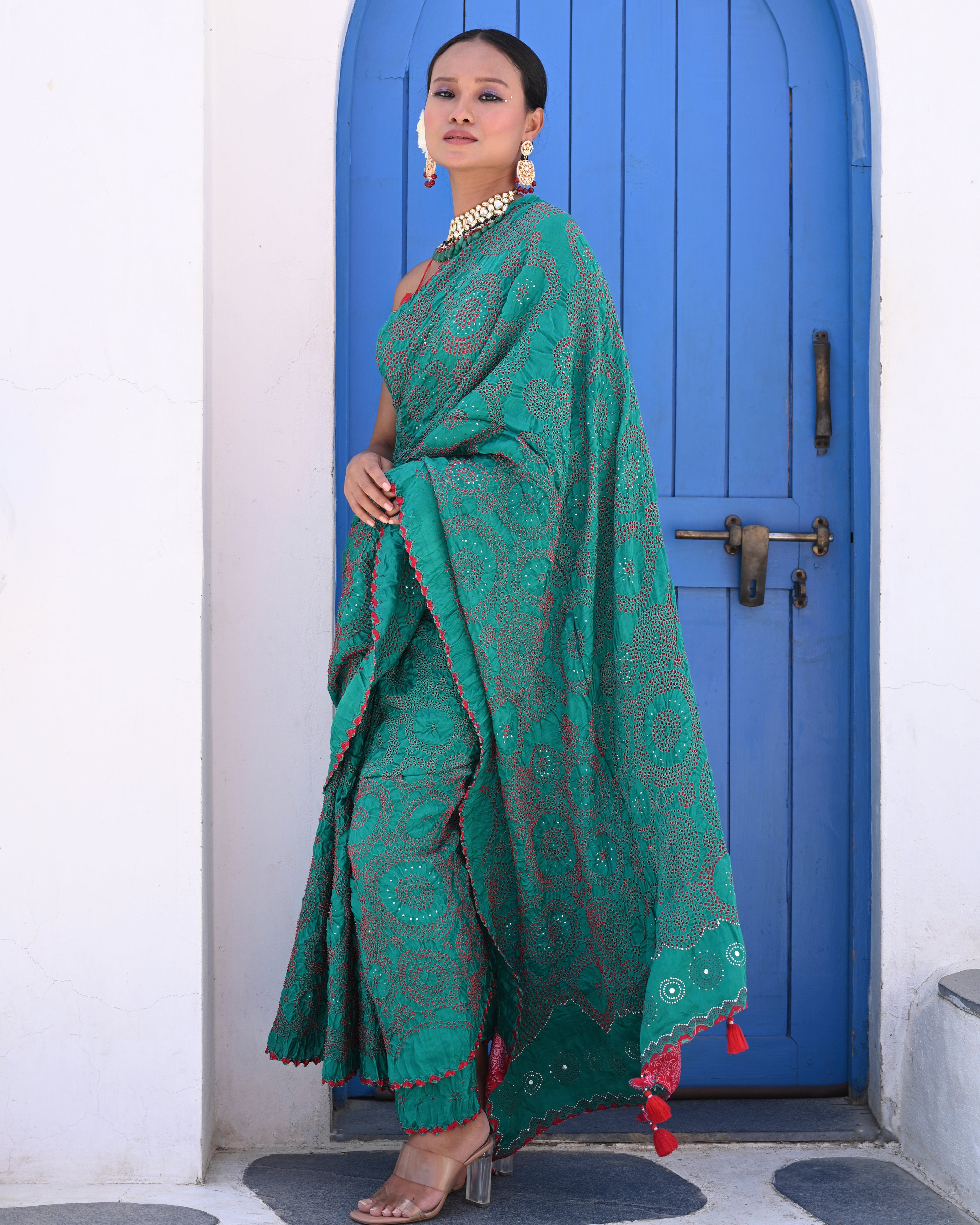 TEAL GREEN CIRCLES OF THE LIFE BANDHANI SAREE WITH MUKAISH WORK AND TASSELS