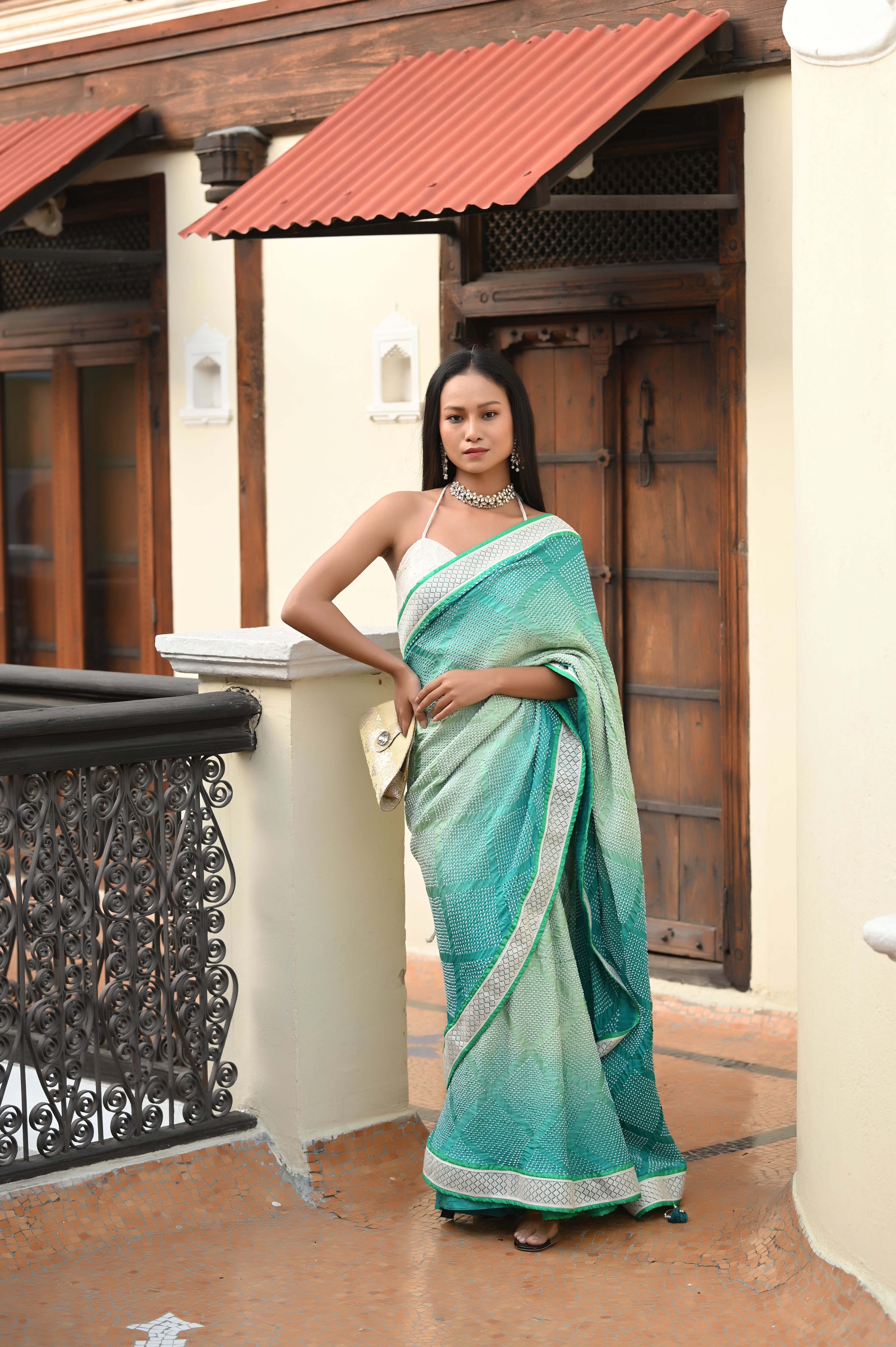 LIGHT GREEN DIAMOND GEOMETRIC BANDHANI SAREE WITH LACE BORDER AND TASSELS