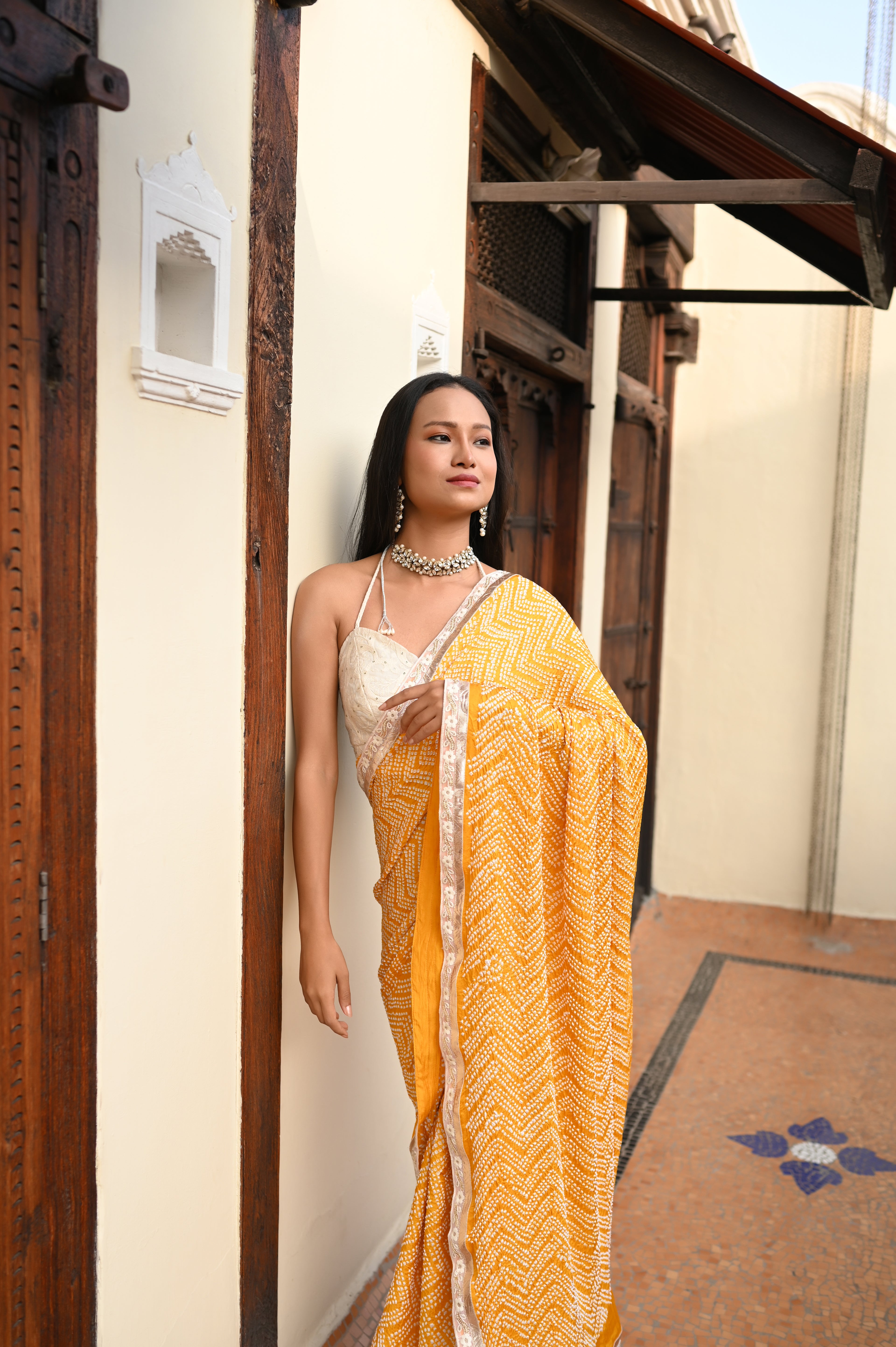 YELLOW O3 CHEVRON BANDHANI SILK SAREE WITH LAMPI BORDER AND TASSELS