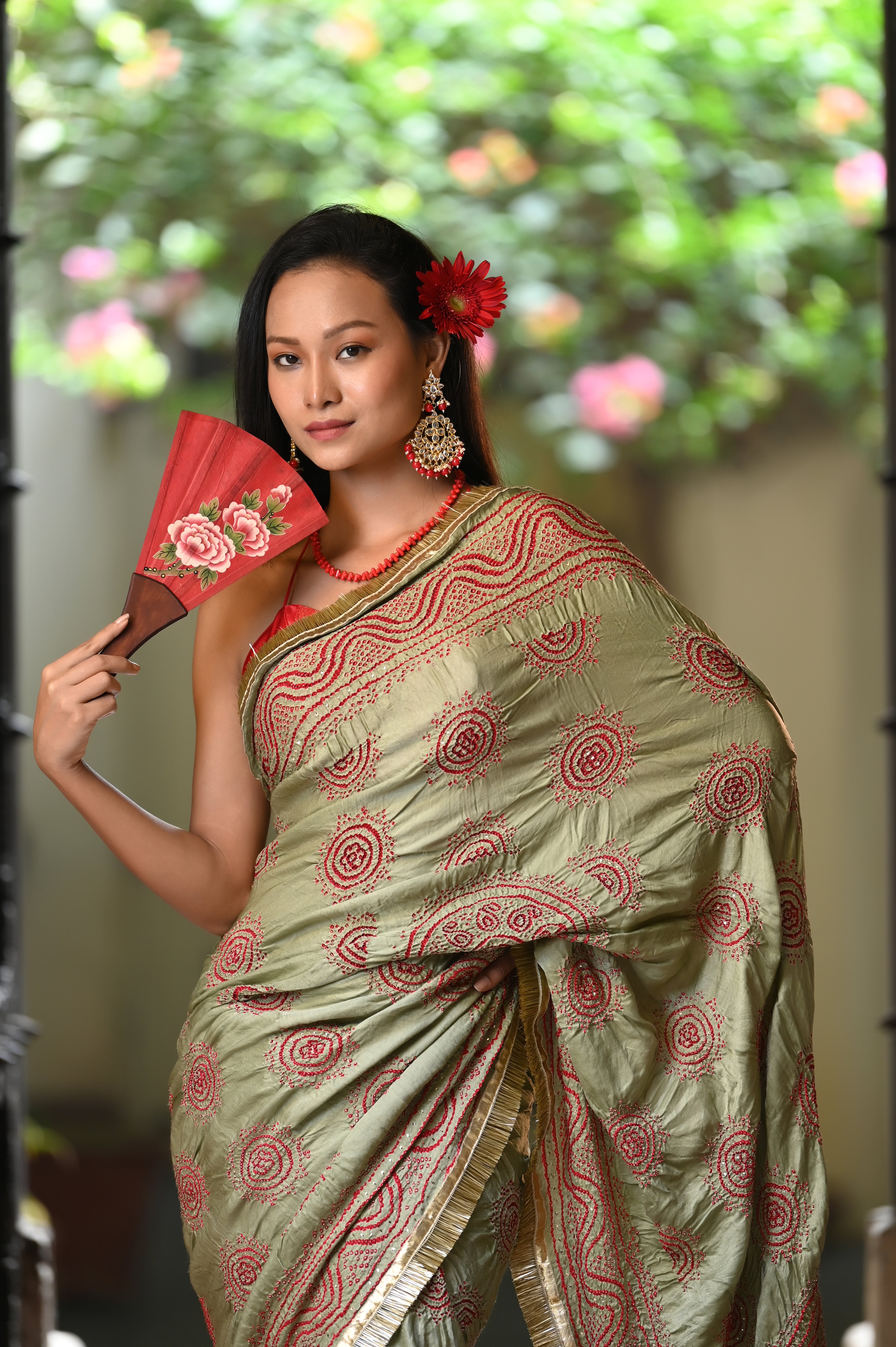 LIGHT GREEN CLASSIC TRADITIONAL LADDU BANDHANI SILK SAREE WITH MUKAISH WORK AND KIRAN BORDER