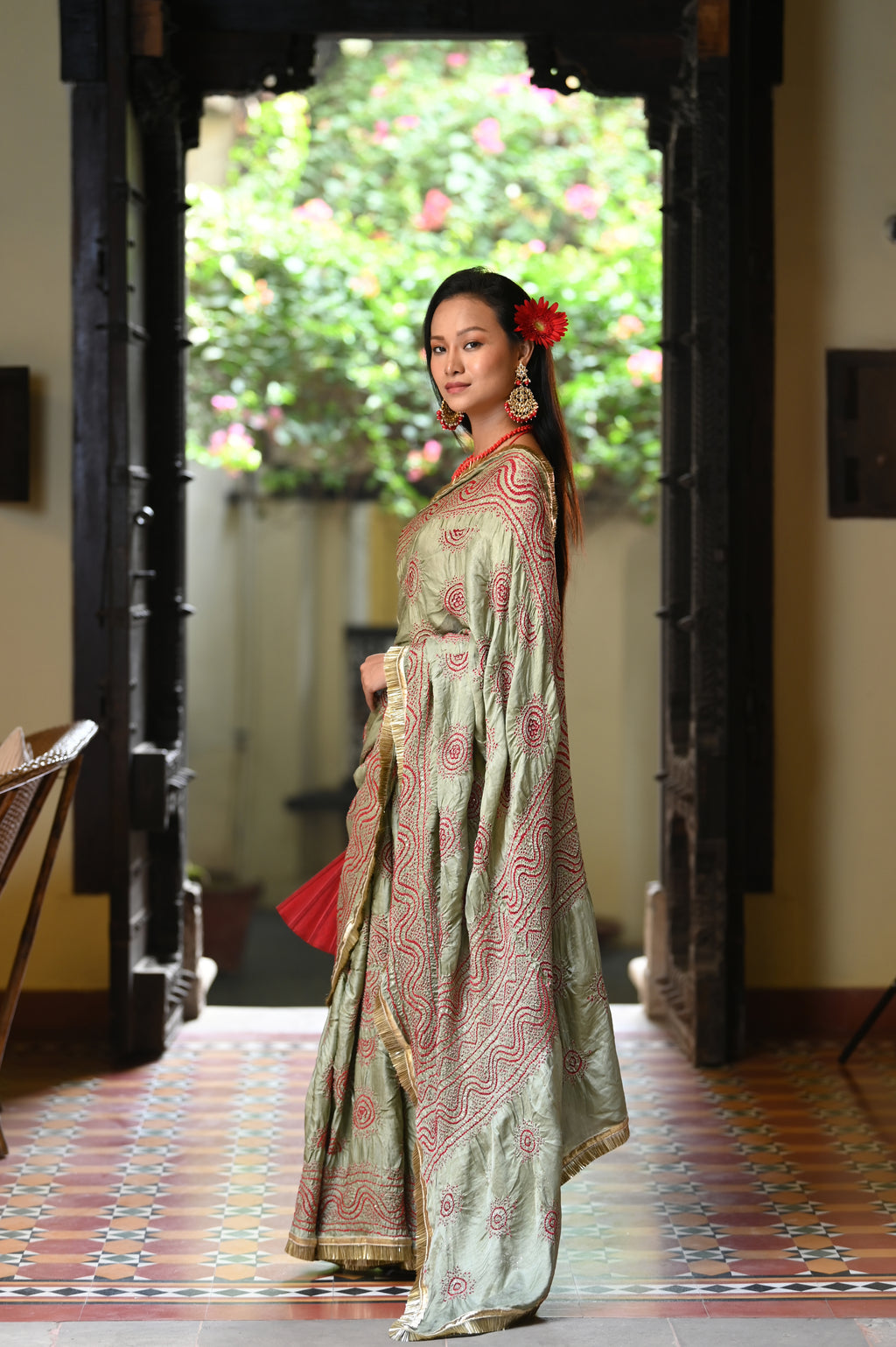 LIGHT GREEN CLASSIC TRADITIONAL LADDU BANDHANI SILK SAREE WITH MUKAISH WORK AND KIRAN BORDER