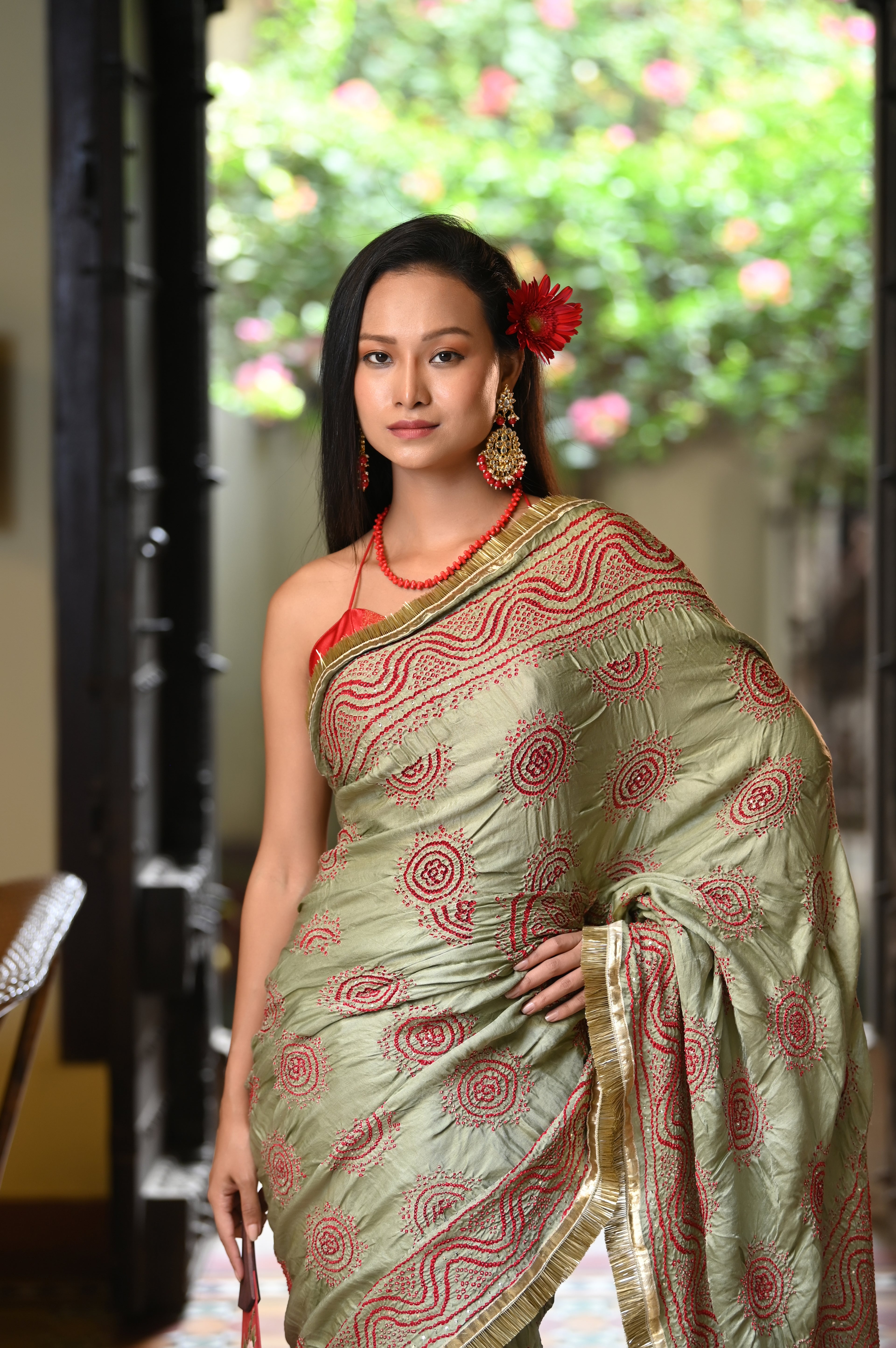 LIGHT GREEN CLASSIC TRADITIONAL LADDU BANDHANI SILK SAREE WITH MUKAISH WORK AND KIRAN BORDER