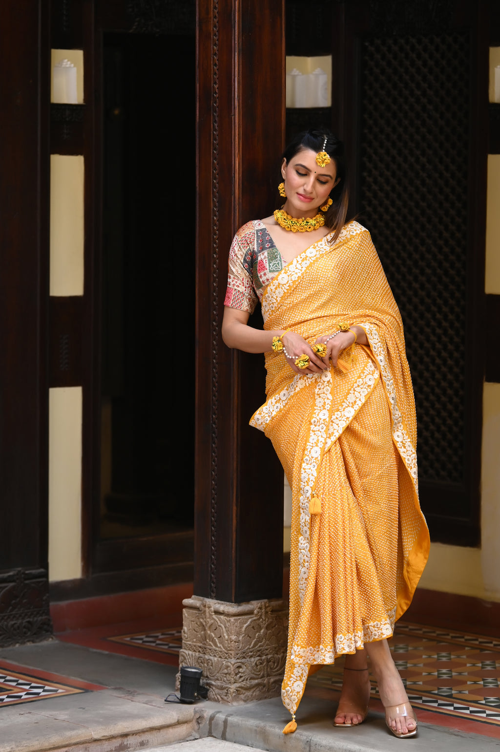 YELLOW ETERNAL DOTS BANDHANI SILK SAREE WITH LACE BORDER AND TASSELS