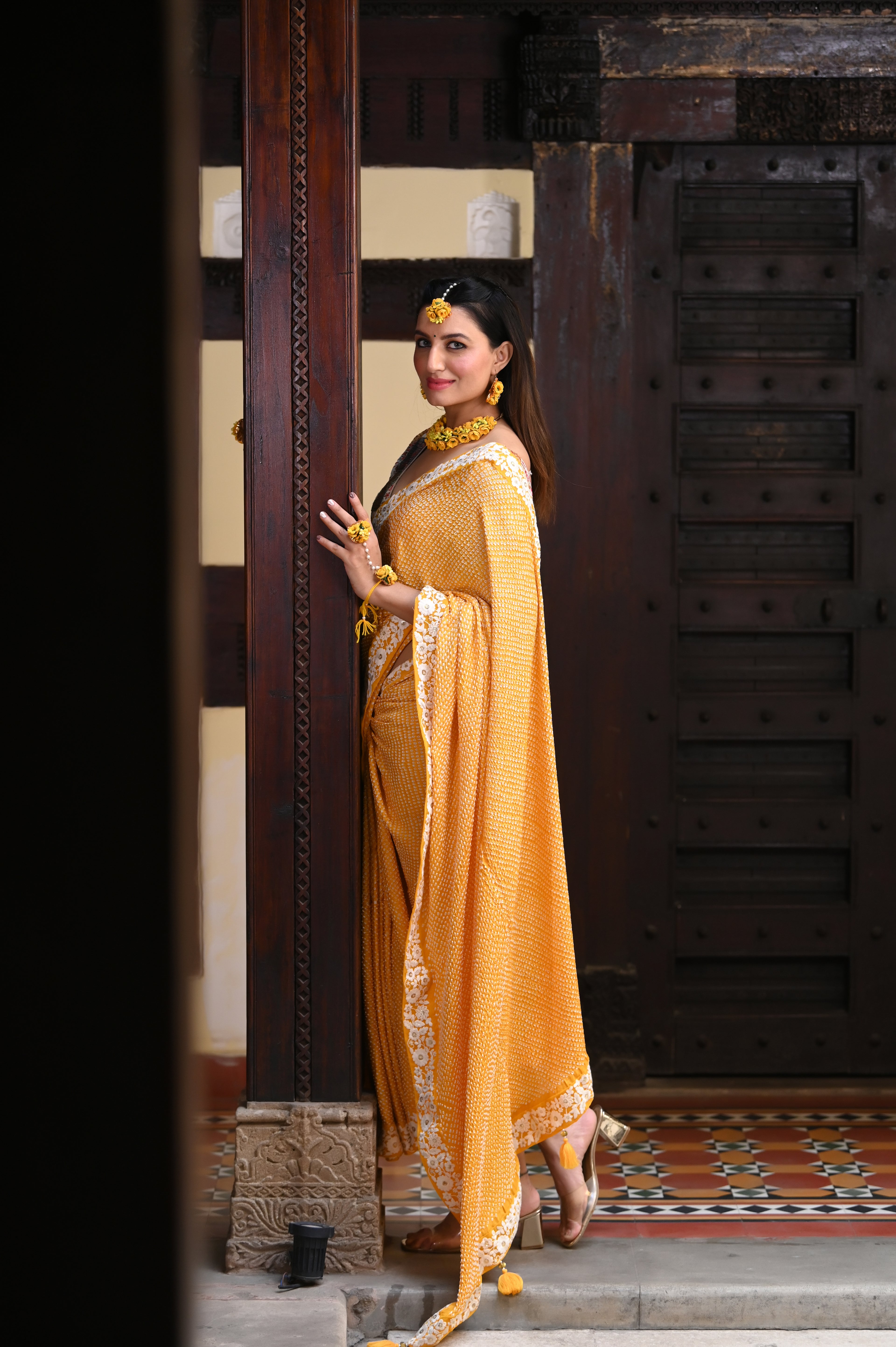 YELLOW ETERNAL DOTS BANDHANI SILK SAREE WITH LACE BORDER AND TASSELS