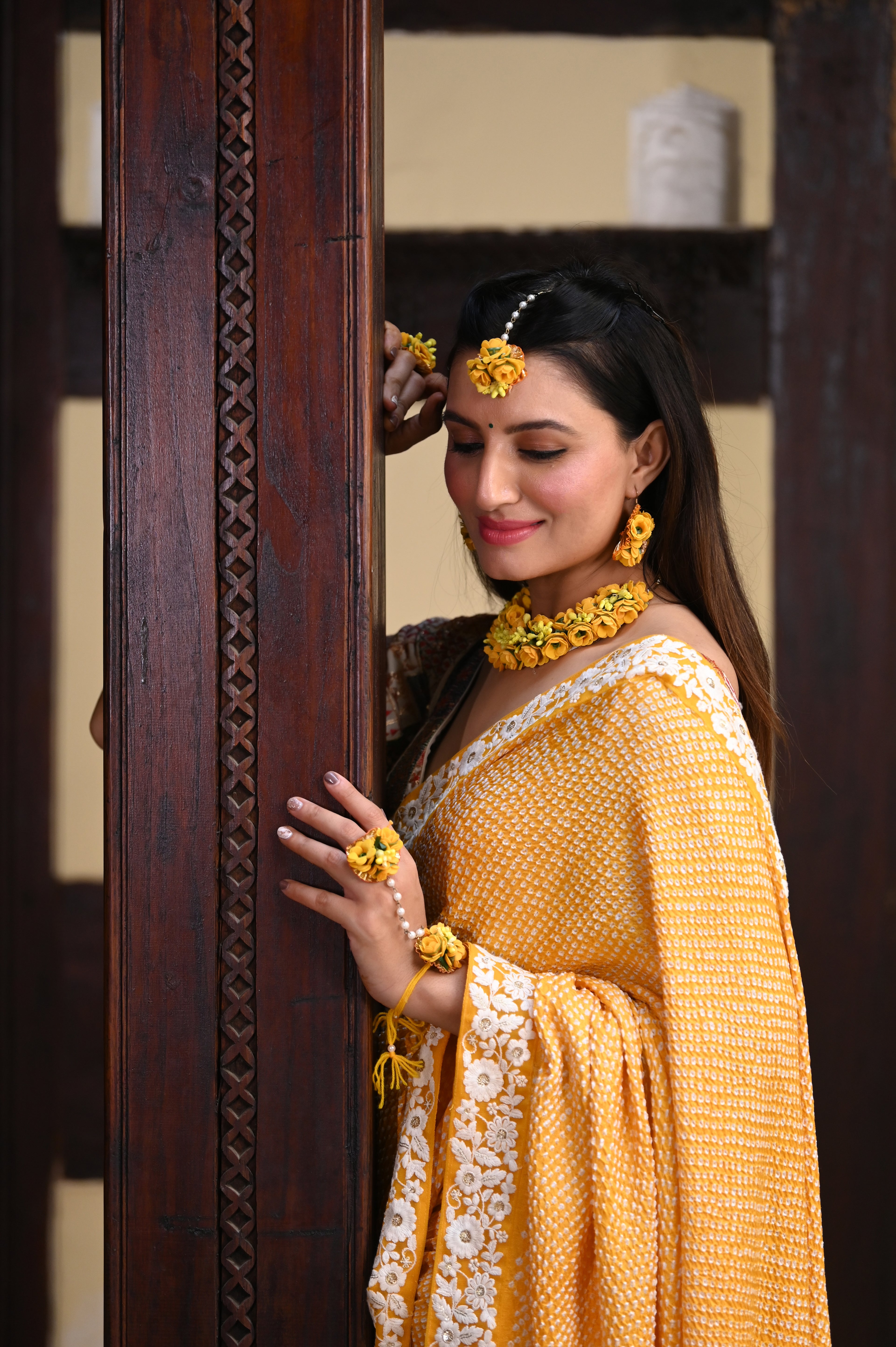 YELLOW ETERNAL DOTS BANDHANI SILK SAREE WITH LACE BORDER AND TASSELS
