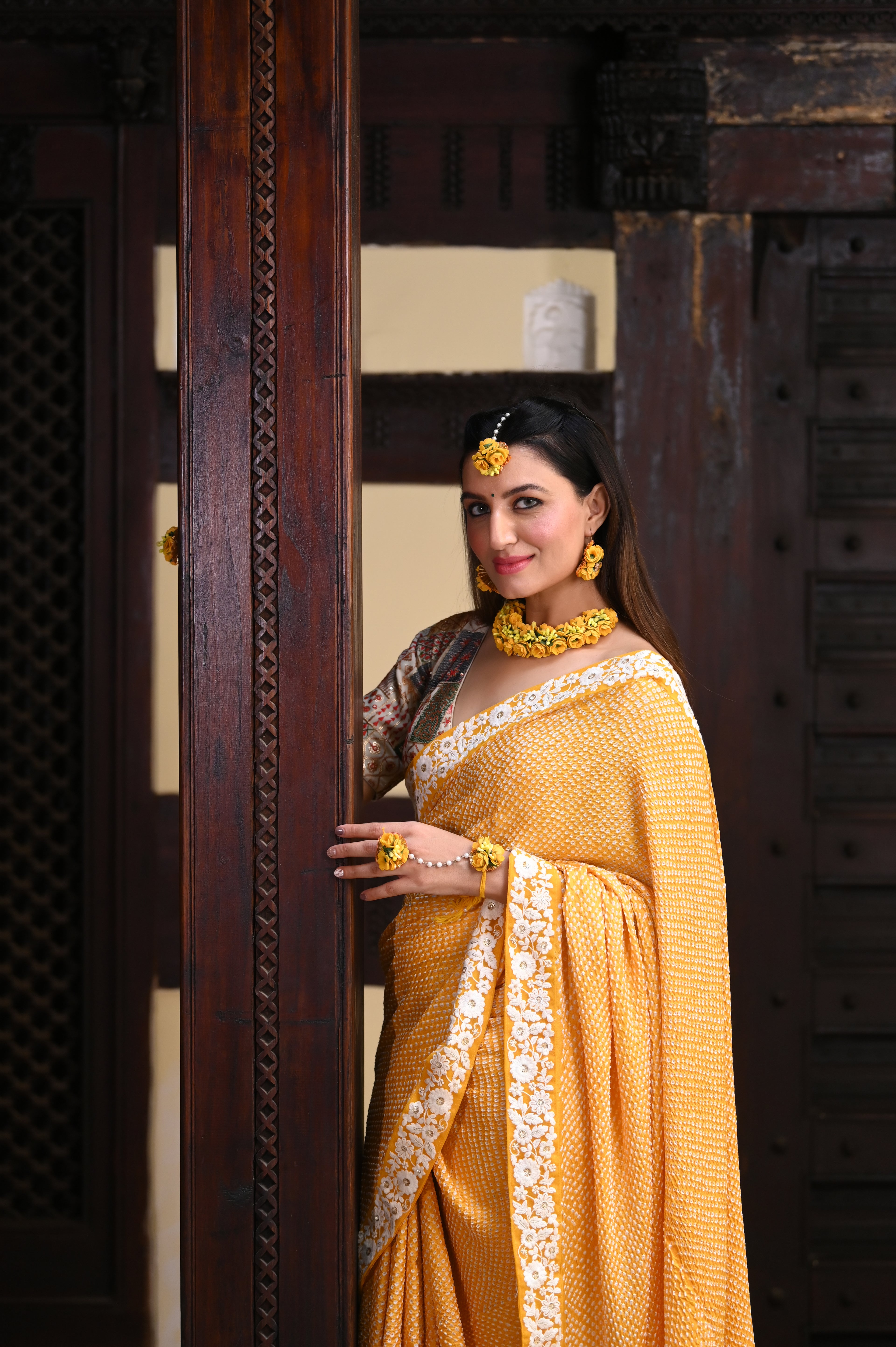 YELLOW ETERNAL DOTS BANDHANI SILK SAREE WITH LACE BORDER AND TASSELS