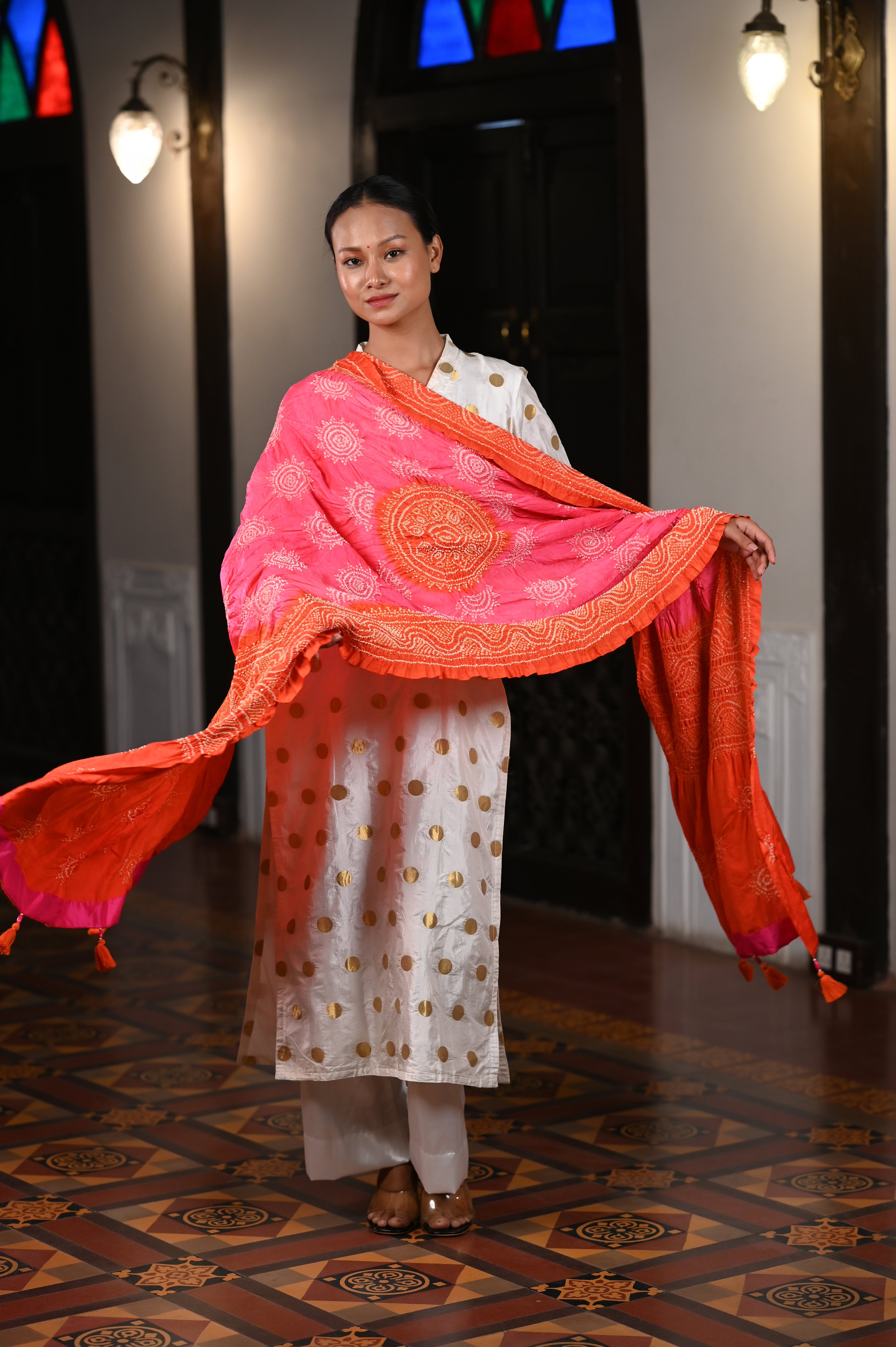 PEACH-ORANGE CLASSIC TRADITIONAL LADDU BANDHANI SILK DUPATTA WITH MUKAISH WORK AND TASSELS
