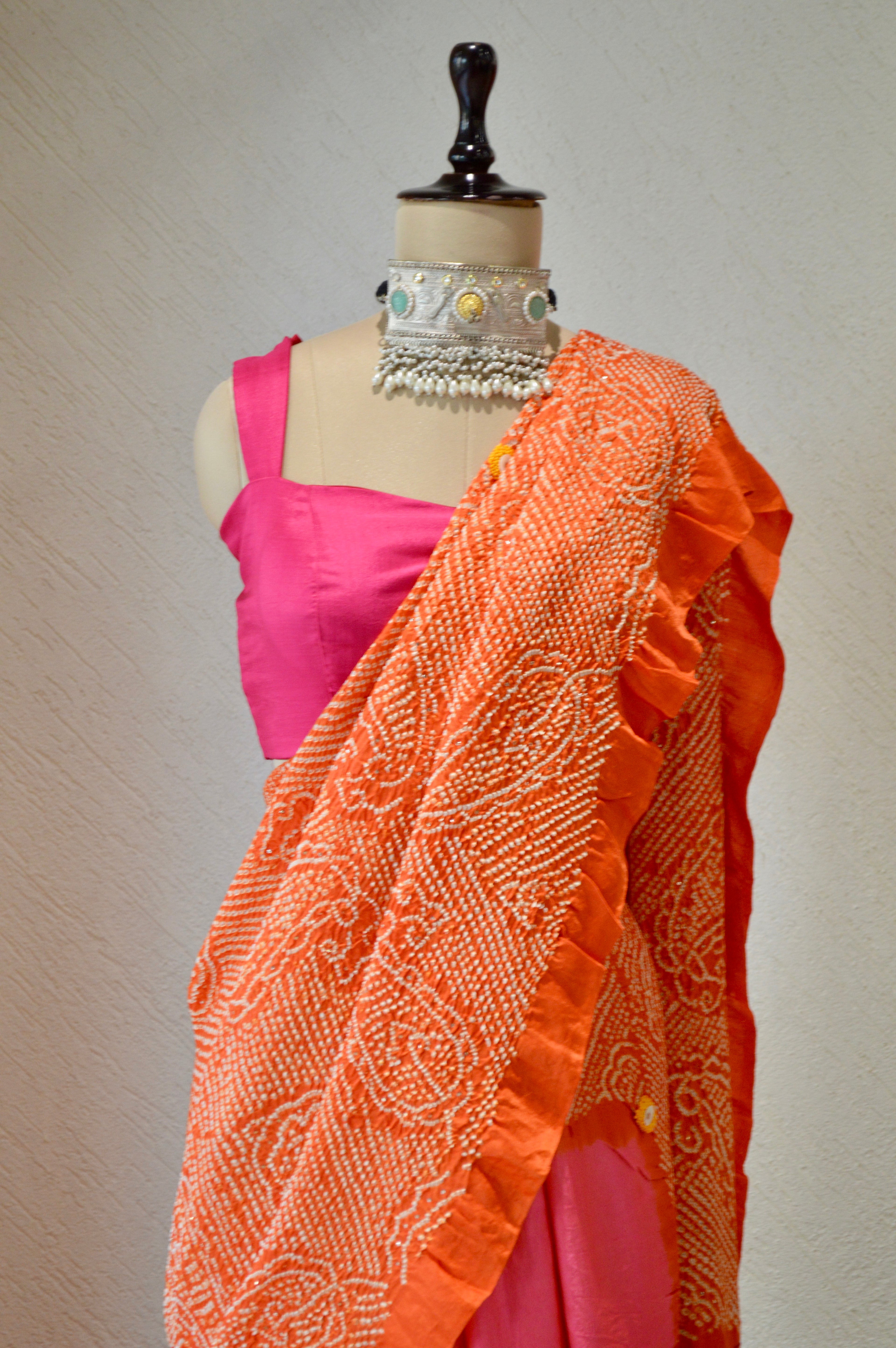 PINK-ORANGE YIN-YANG HALF FULL HALF EMPTY PAISLEY BANDHANI EMBROIDERED SILK SAREE WITH MUKAISH WORK