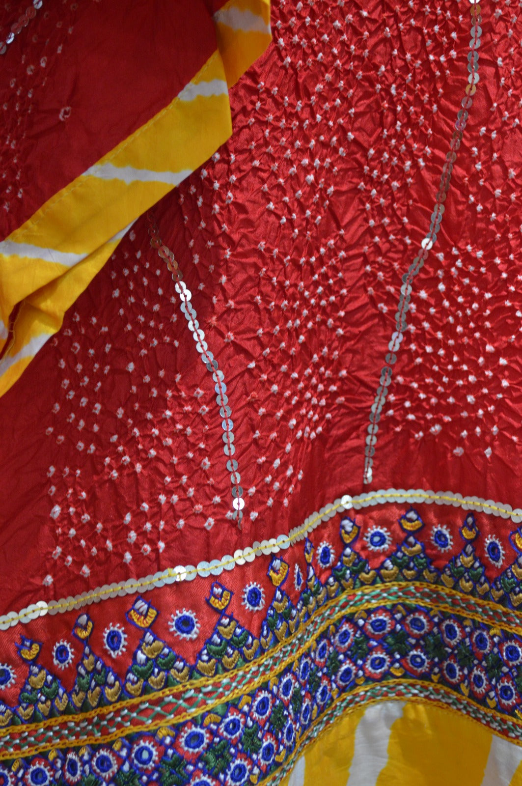 RED ETERNAL DOT BANDHANI SILK DUPATTA WITH KUTCH BORDER AND SEQUIN WORK
