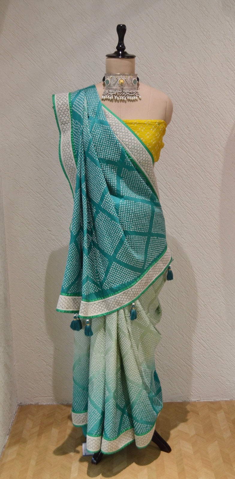 LIGHT GREEN DIAMOND SILK BANDHANI SAREE WITH BORDER AND TASSELS