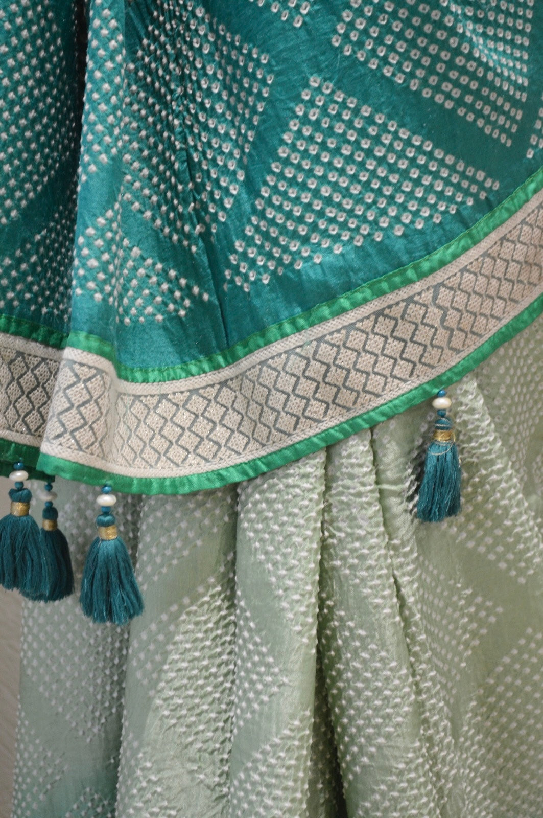 LIGHT GREEN DIAMOND SILK BANDHANI SAREE WITH BORDER AND TASSELS