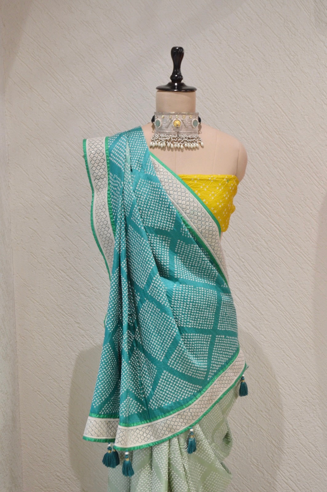 LIGHT GREEN DIAMOND SILK BANDHANI SAREE WITH BORDER AND TASSELS