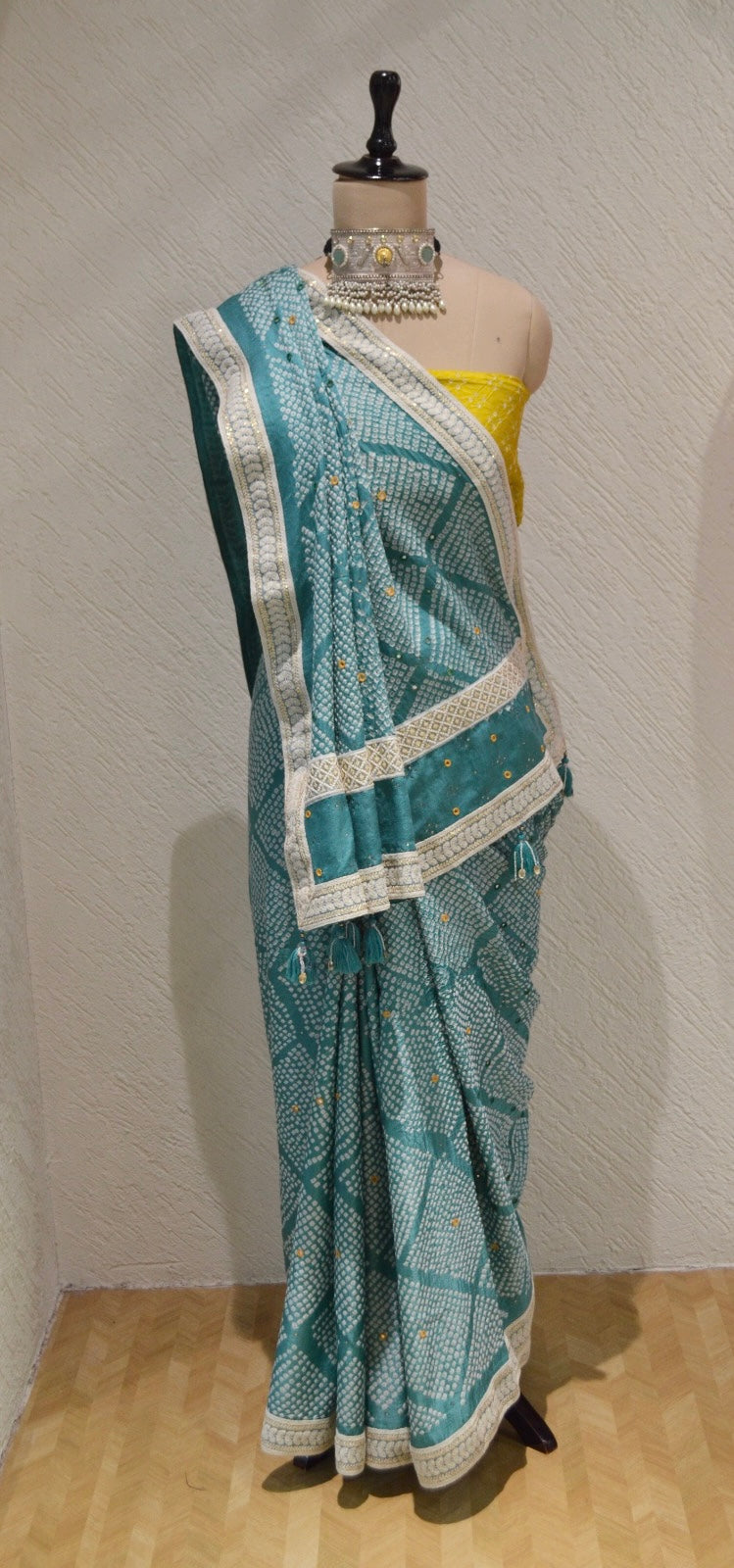 LIGHT BLUE DIAMOND SILK BANDHANI SAREE WITH MIRROR WORK, TASSELS AND BORDER