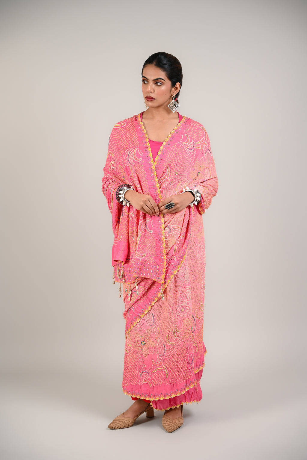 PEACH-PINK FLORAL BANDHANI SILK SAREE WITH EMBROIDERY AND TASSELS