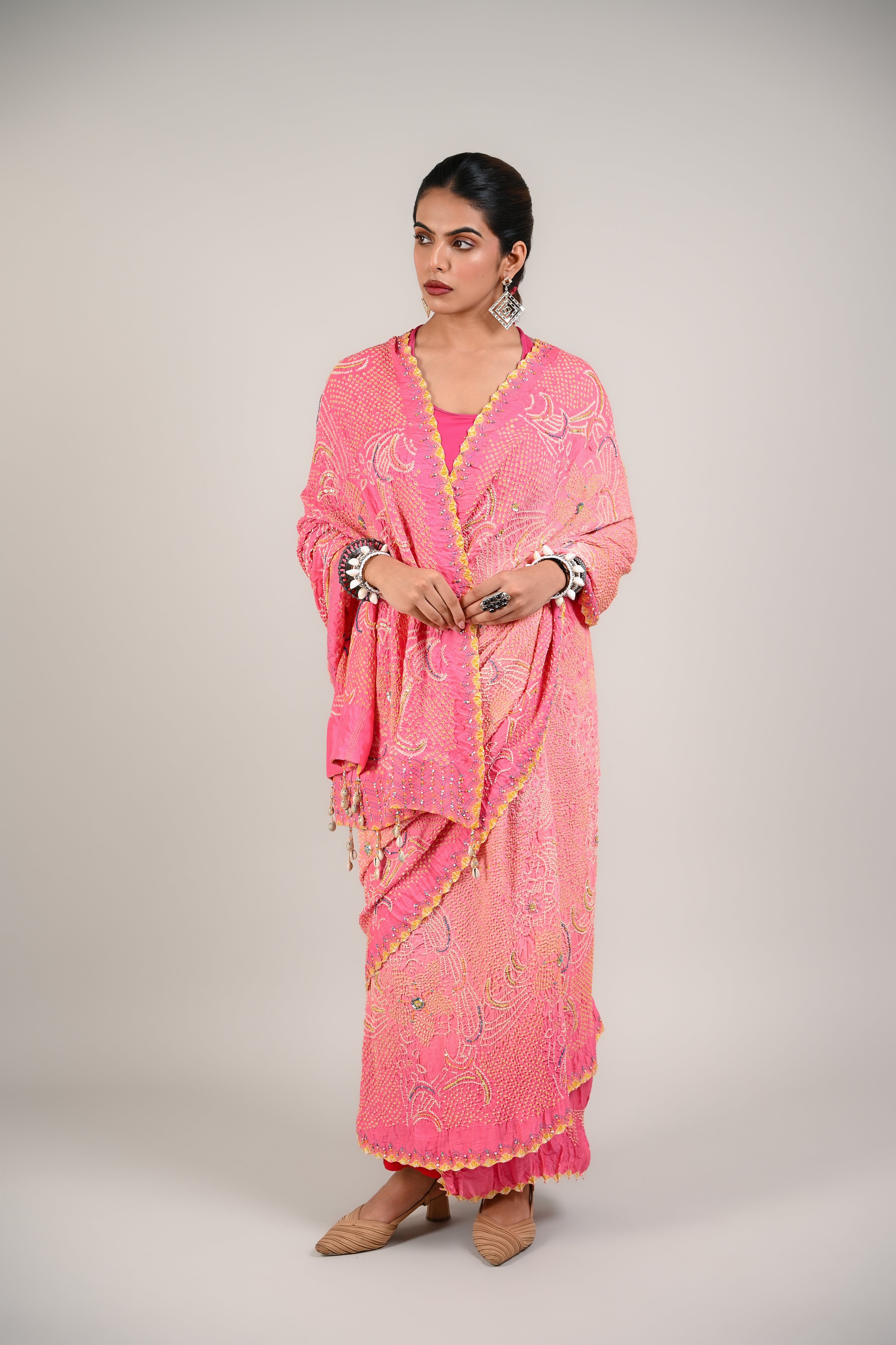 PEACH-PINK FLORAL BANDHANI SILK SAREE WITH EMBROIDERY AND TASSELS