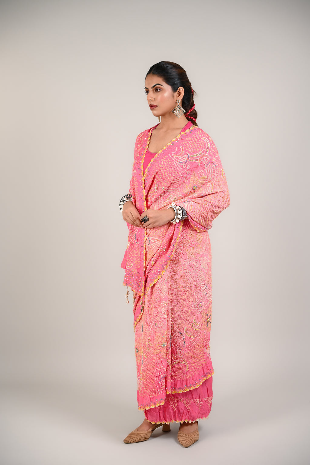 PEACH-PINK FLORAL BANDHANI SILK SAREE WITH EMBROIDERY AND TASSELS