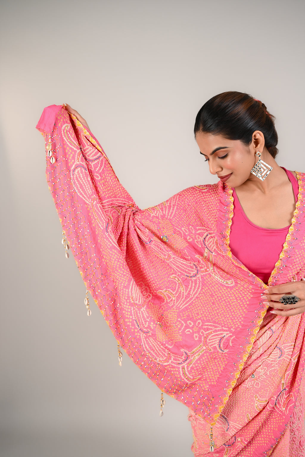 PEACH-PINK FLORAL BANDHANI SILK SAREE WITH EMBROIDERY AND TASSELS