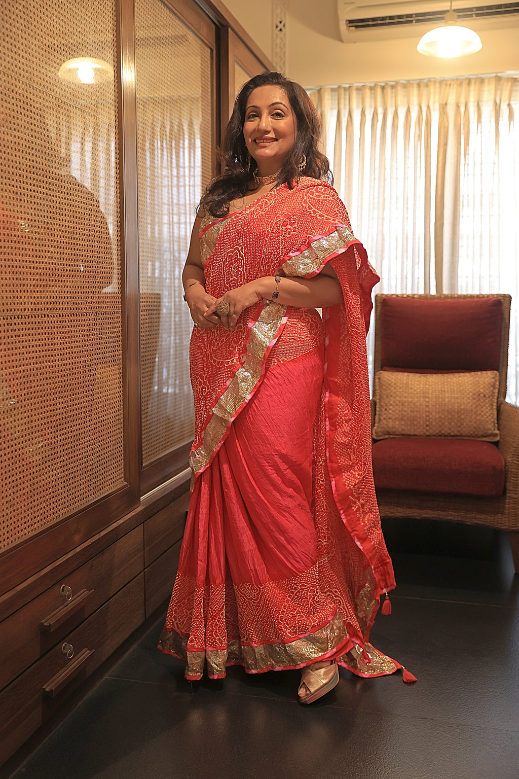 ORANGE-PINK YIN-YANG HALF FULL HALF EMPTY PAISLEY BANDHANI SILK SAREE WITH LAMPI BORDER