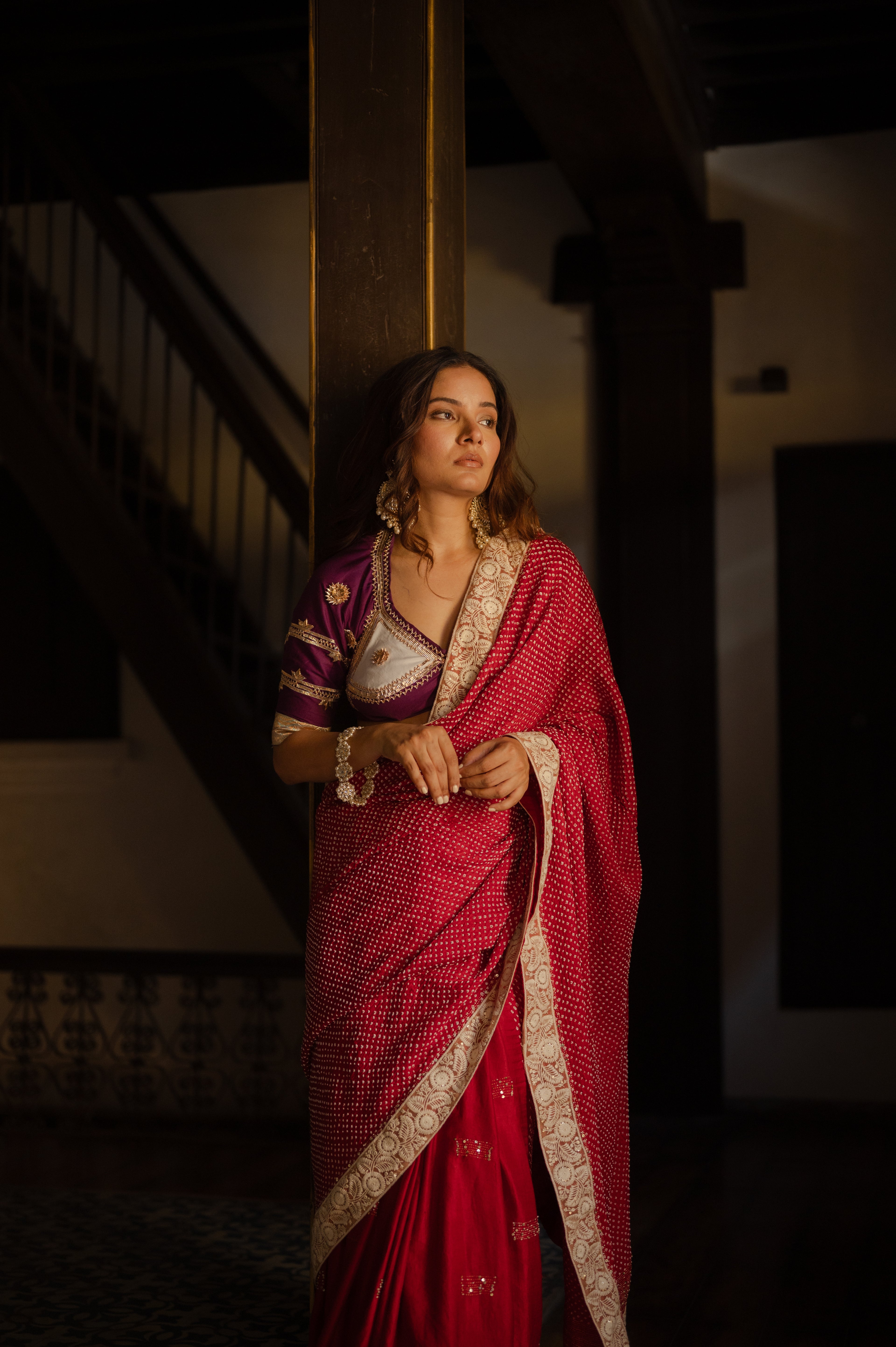 RED YIN-YANG” HALF FULL HALF EMPTY ETERNAL DOTS SILK BANDHANI SAREE WITH EMBROIDERY AND EMBROIDERED LACE