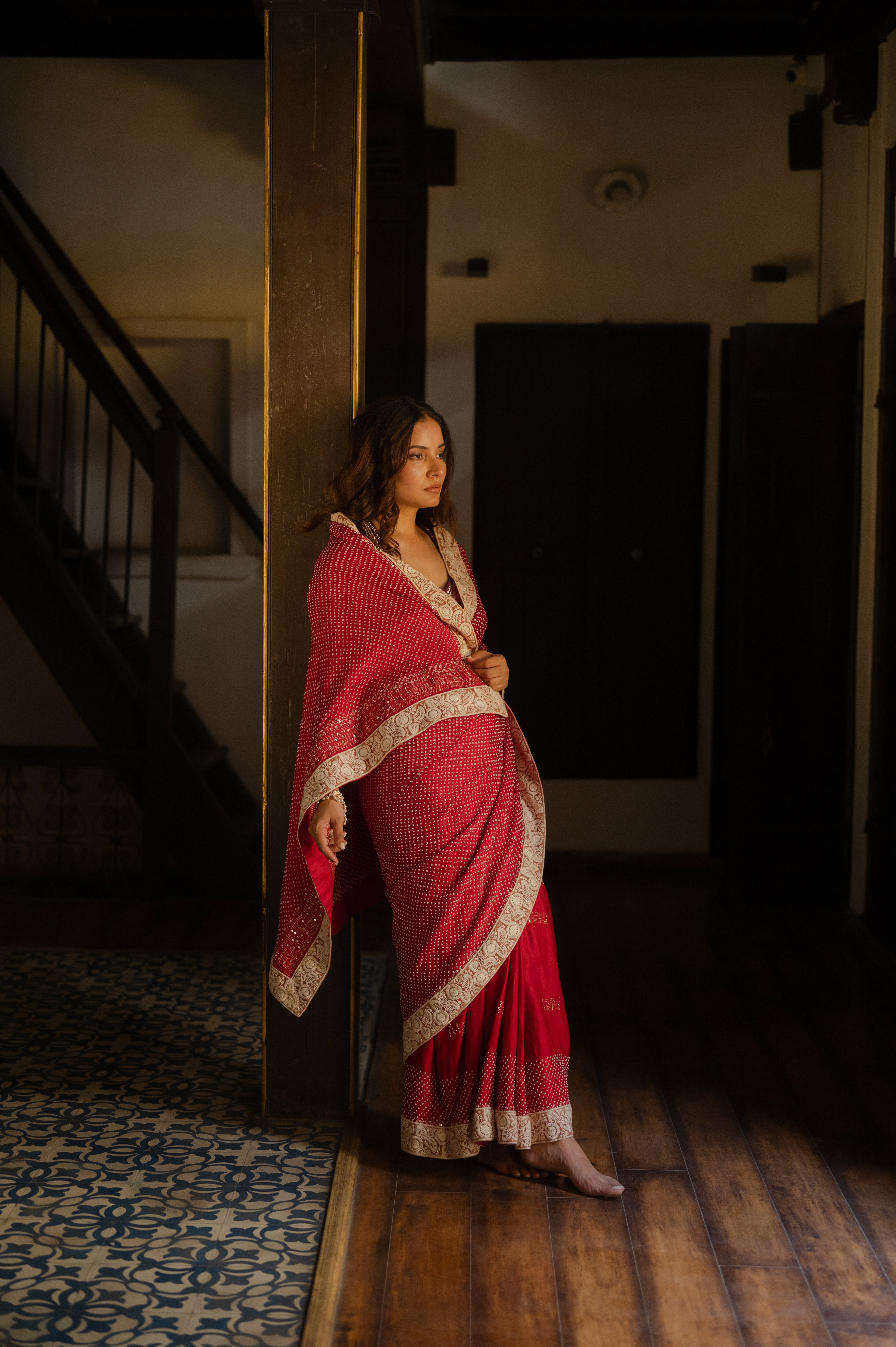 RED YIN-YANG” HALF FULL HALF EMPTY ETERNAL DOTS SILK BANDHANI SAREE WITH EMBROIDERY AND EMBROIDERED LACE