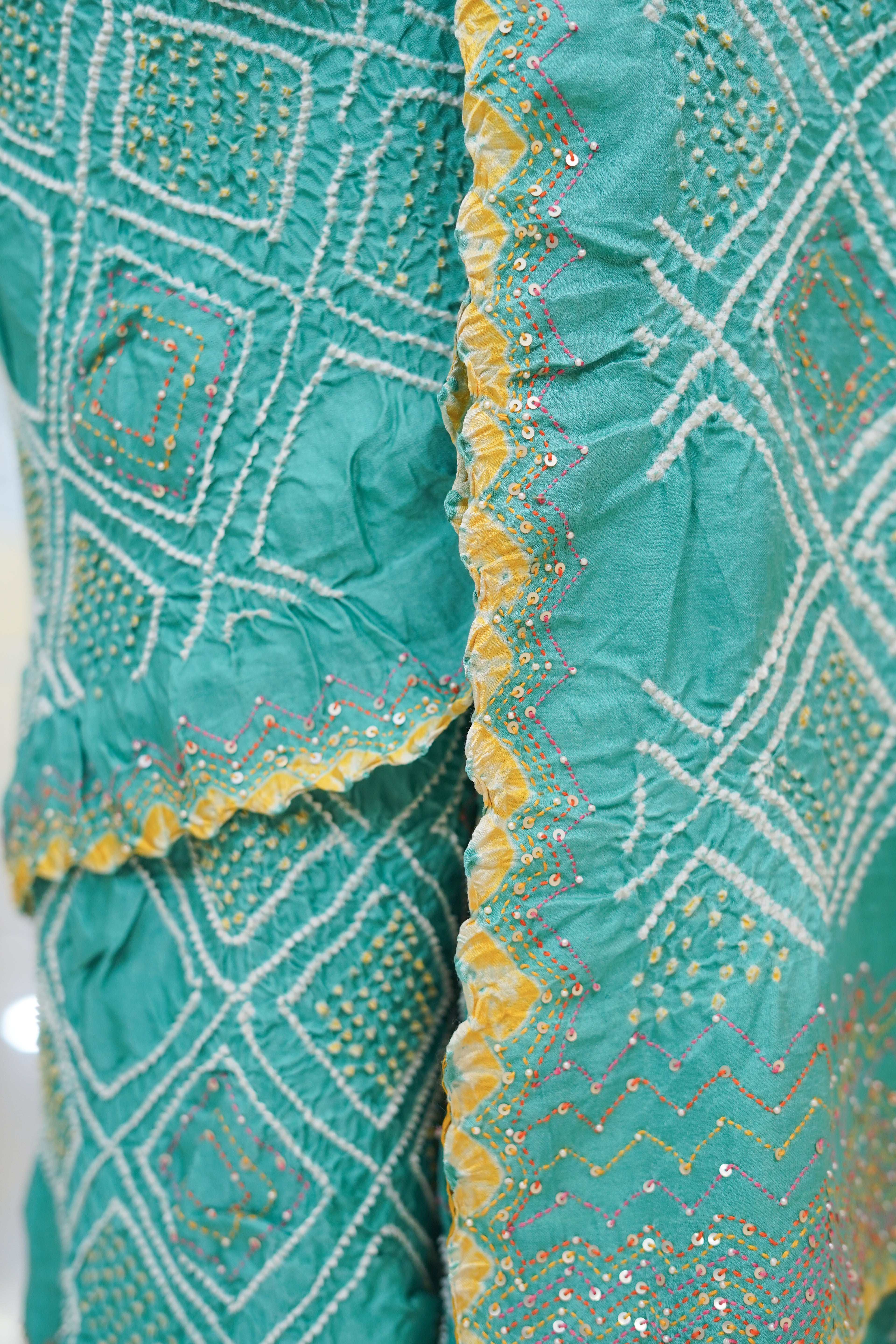 LIGHT BLUE DIAMOND GEOMETRIC SILK BANDHANI SAREE WITH HAND EMBROIDERY AND TASSELS