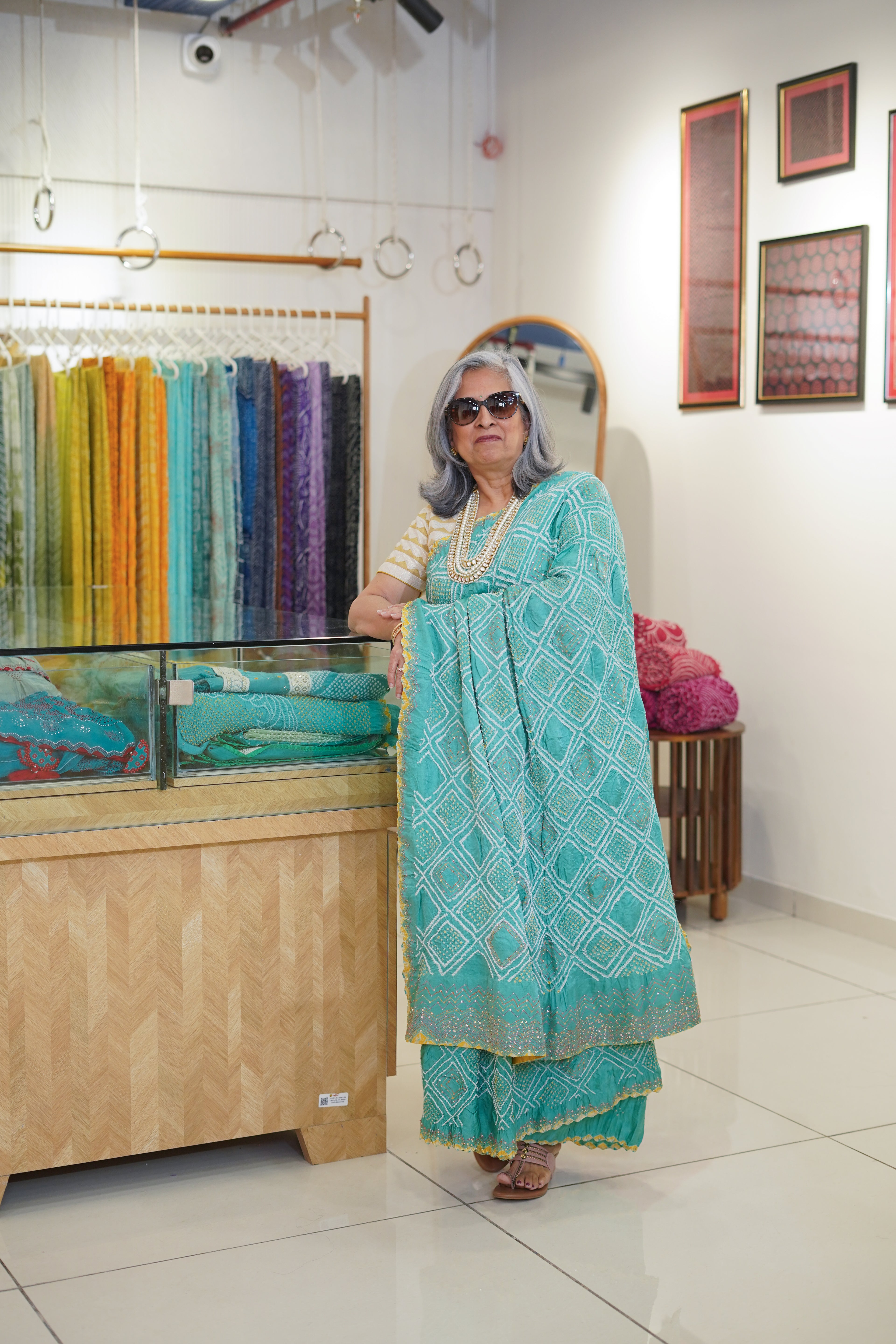 LIGHT BLUE DIAMOND GEOMETRIC SILK BANDHANI SAREE WITH HAND EMBROIDERY AND TASSELS