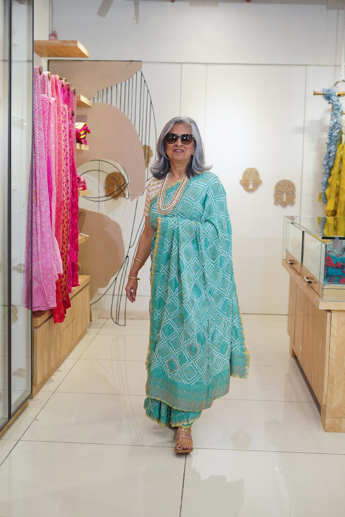 LIGHT BLUE DIAMOND GEOMETRIC SILK BANDHANI SAREE WITH HAND EMBROIDERY AND TASSELS