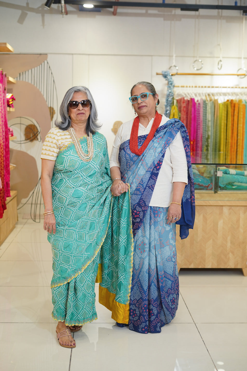 LIGHT BLUE DIAMOND GEOMETRIC SILK BANDHANI SAREE WITH HAND EMBROIDERY AND TASSELS